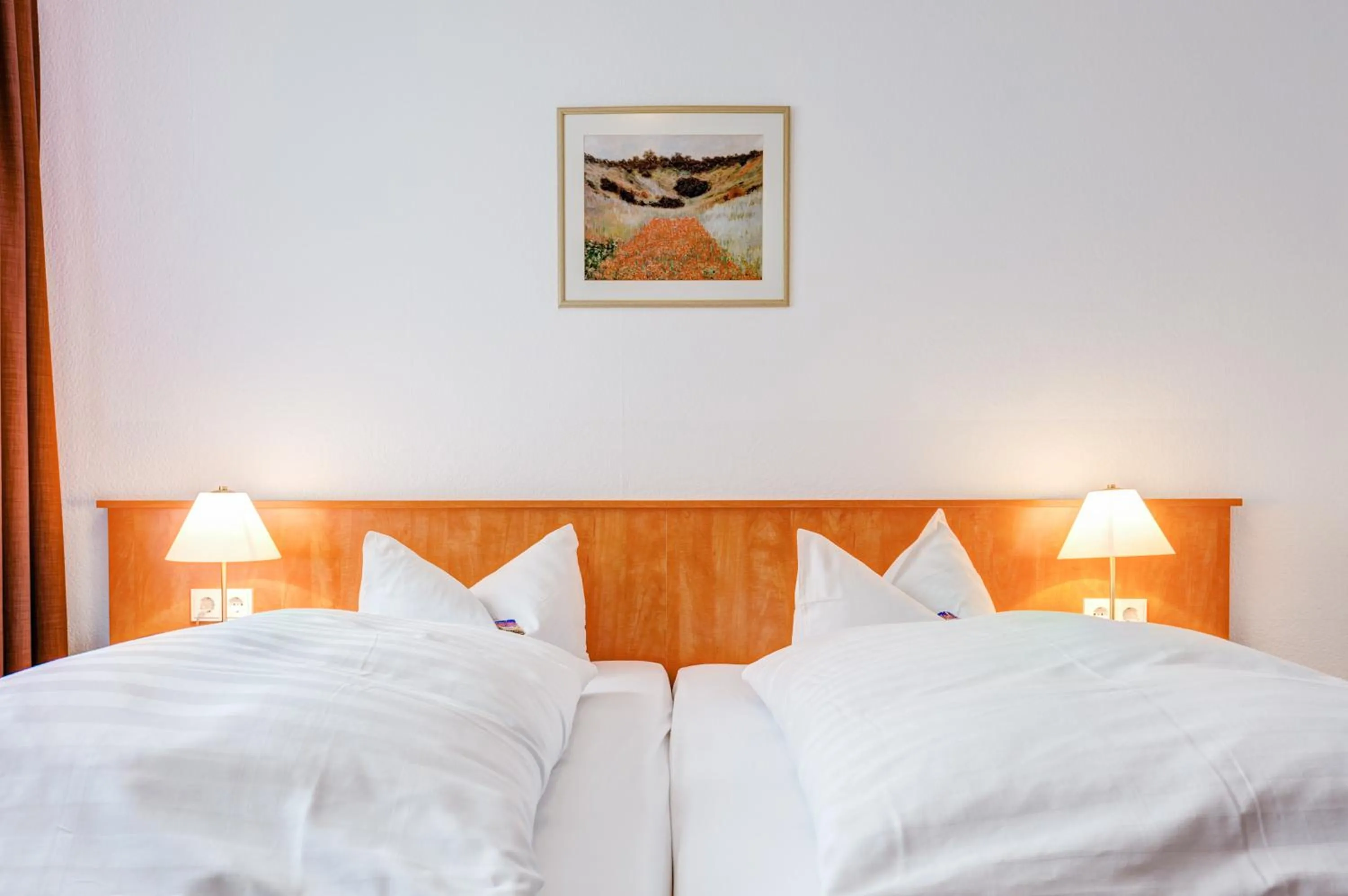 Bed in Hotel Antares München