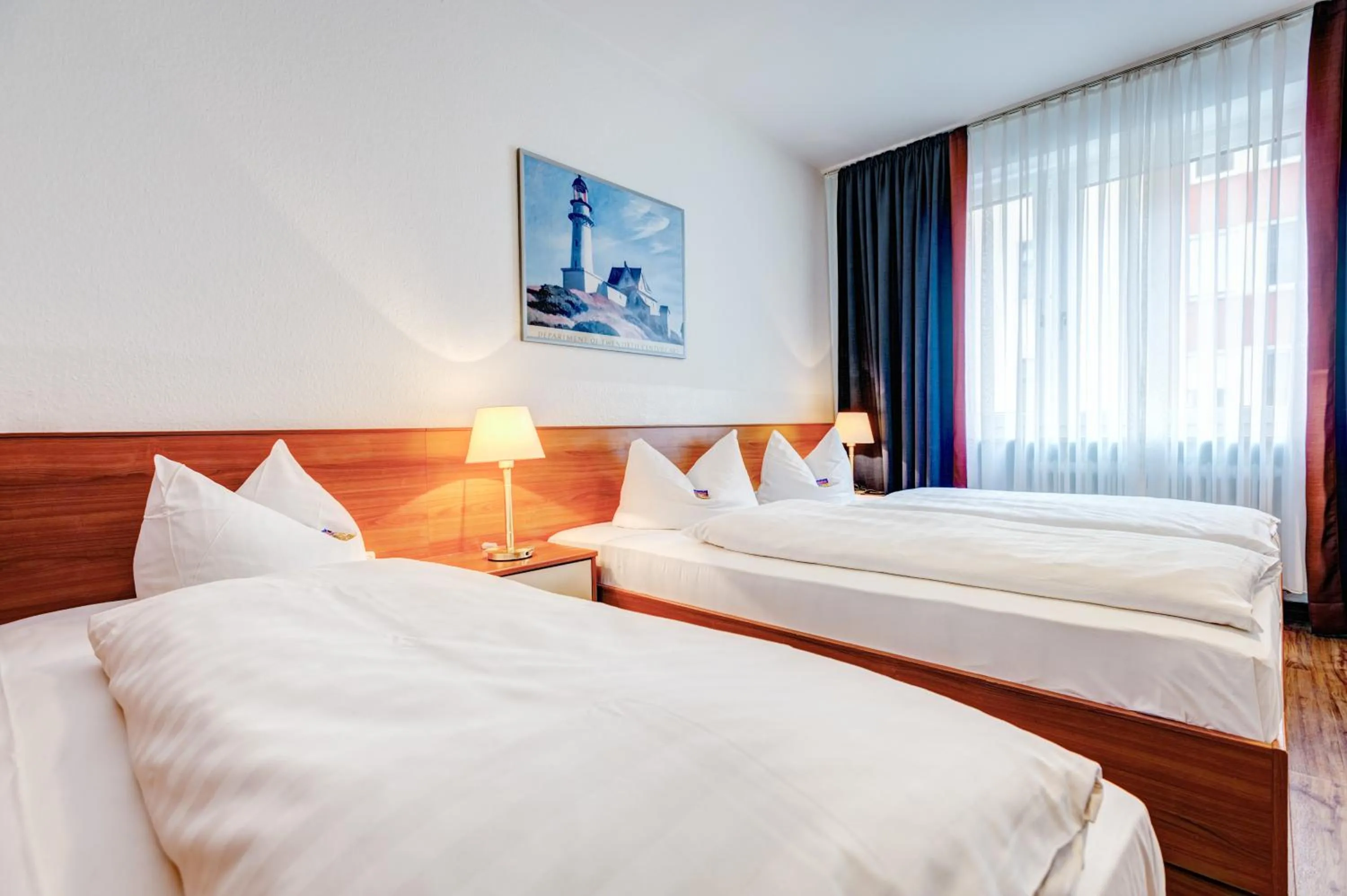 Bed in Hotel Antares München