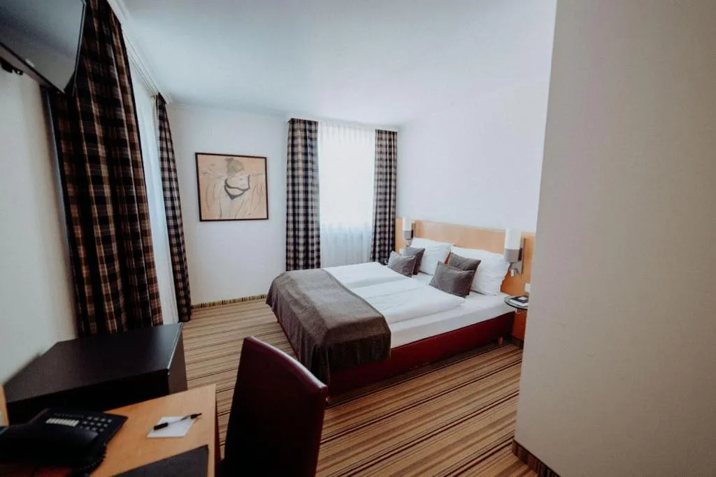 Bed in Hotel Ars Vivendi München