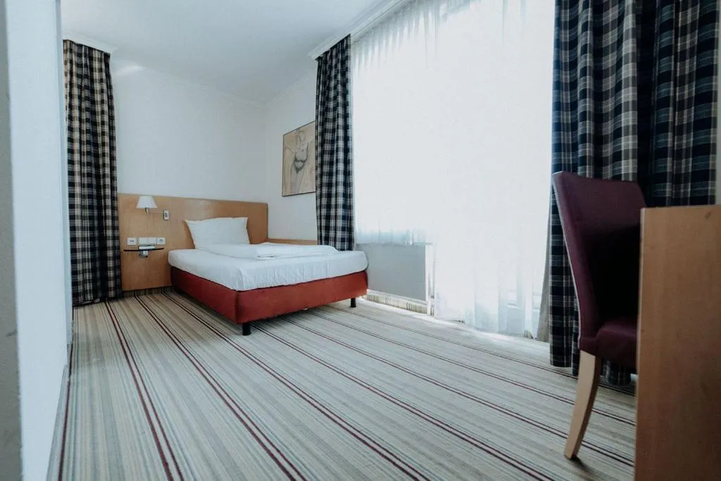 Bed in Hotel Ars Vivendi München