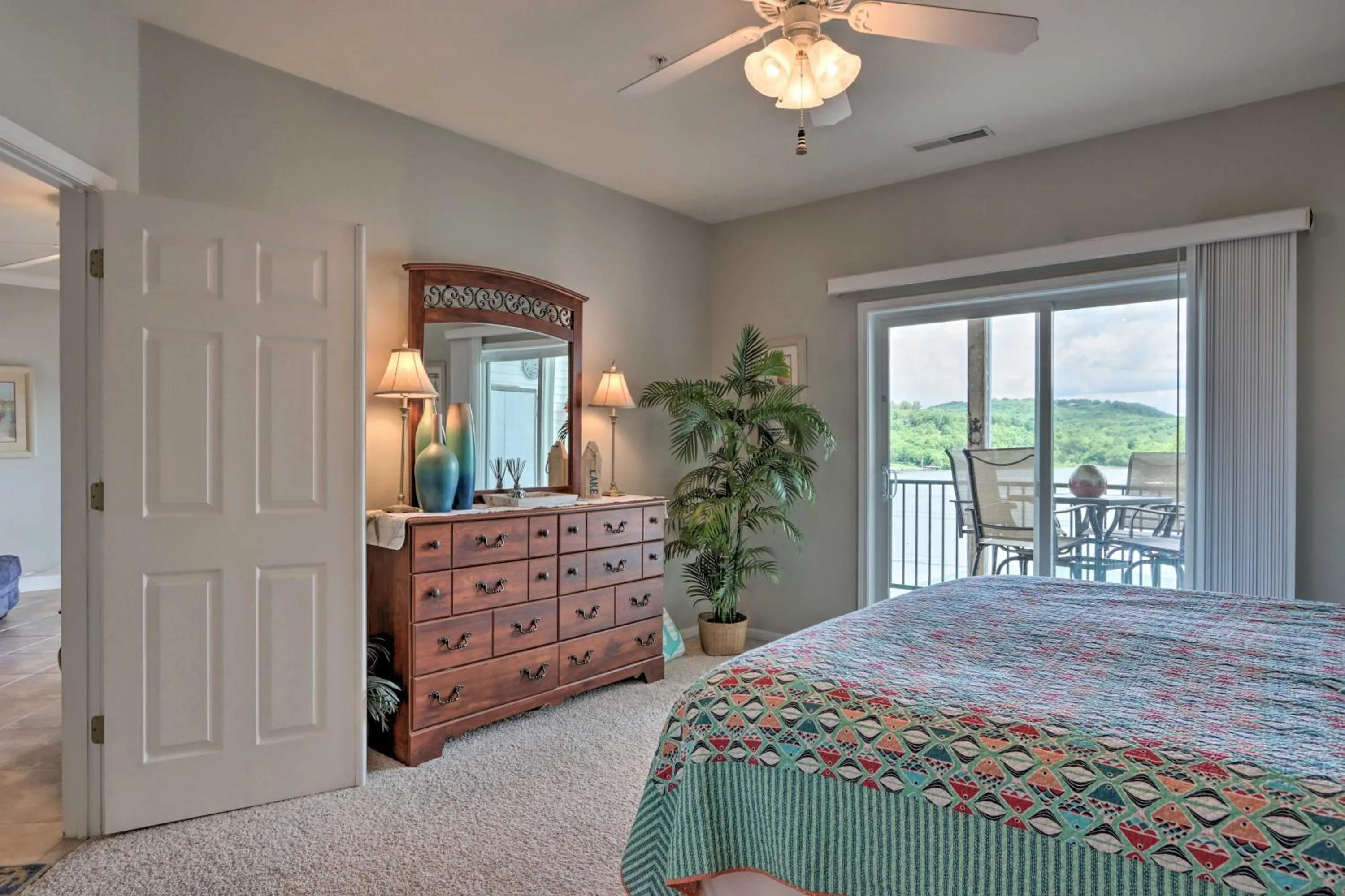 Bed in Lakefront Ozark Condo with Balcony and Seasonal Pool!