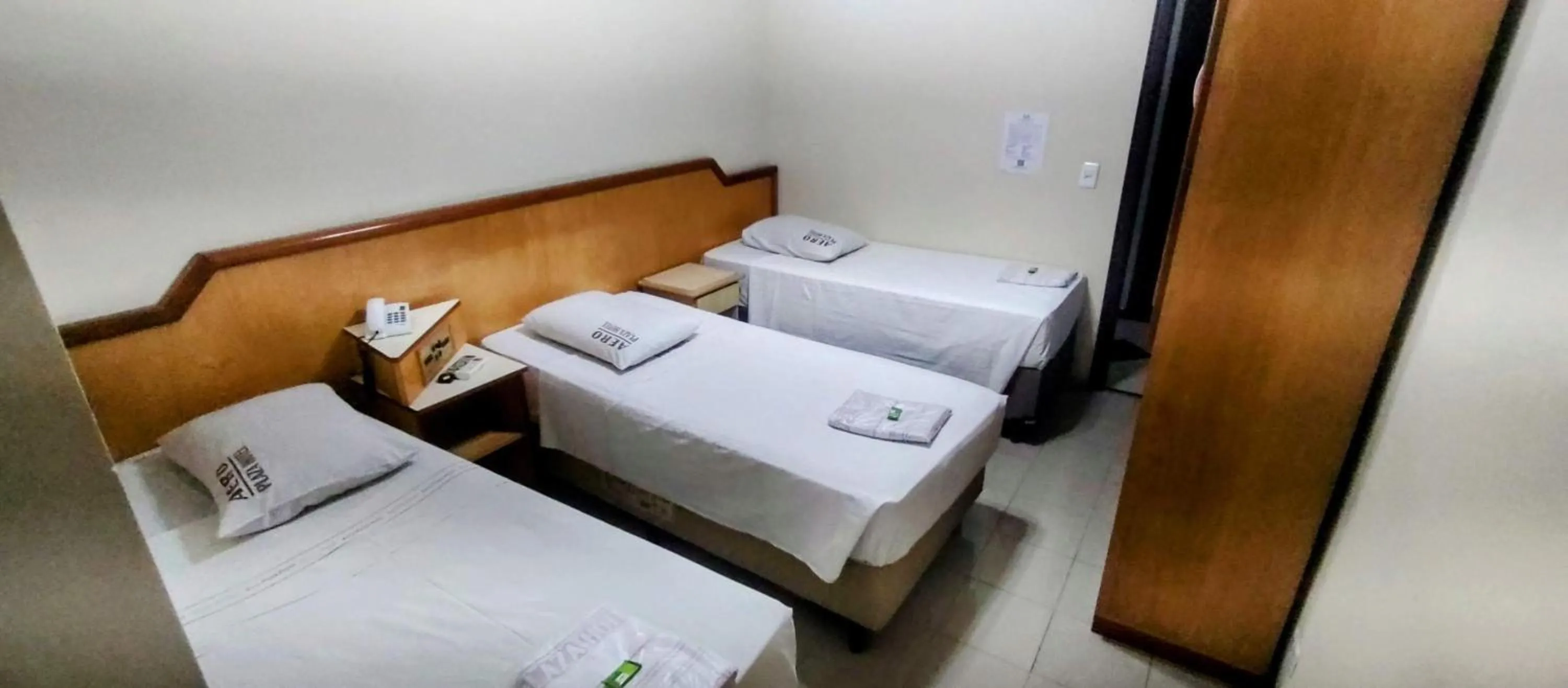Bed in Aero Plaza Hotel