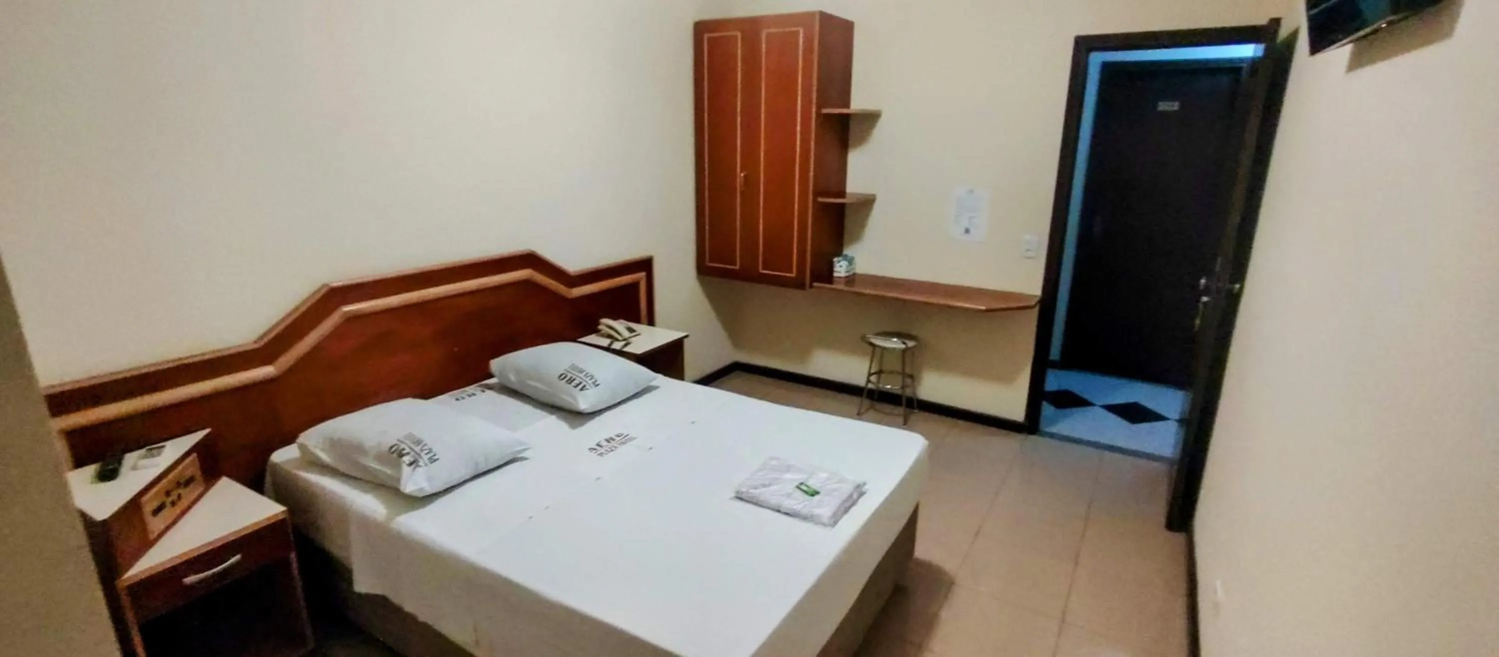 Bed in Aero Plaza Hotel