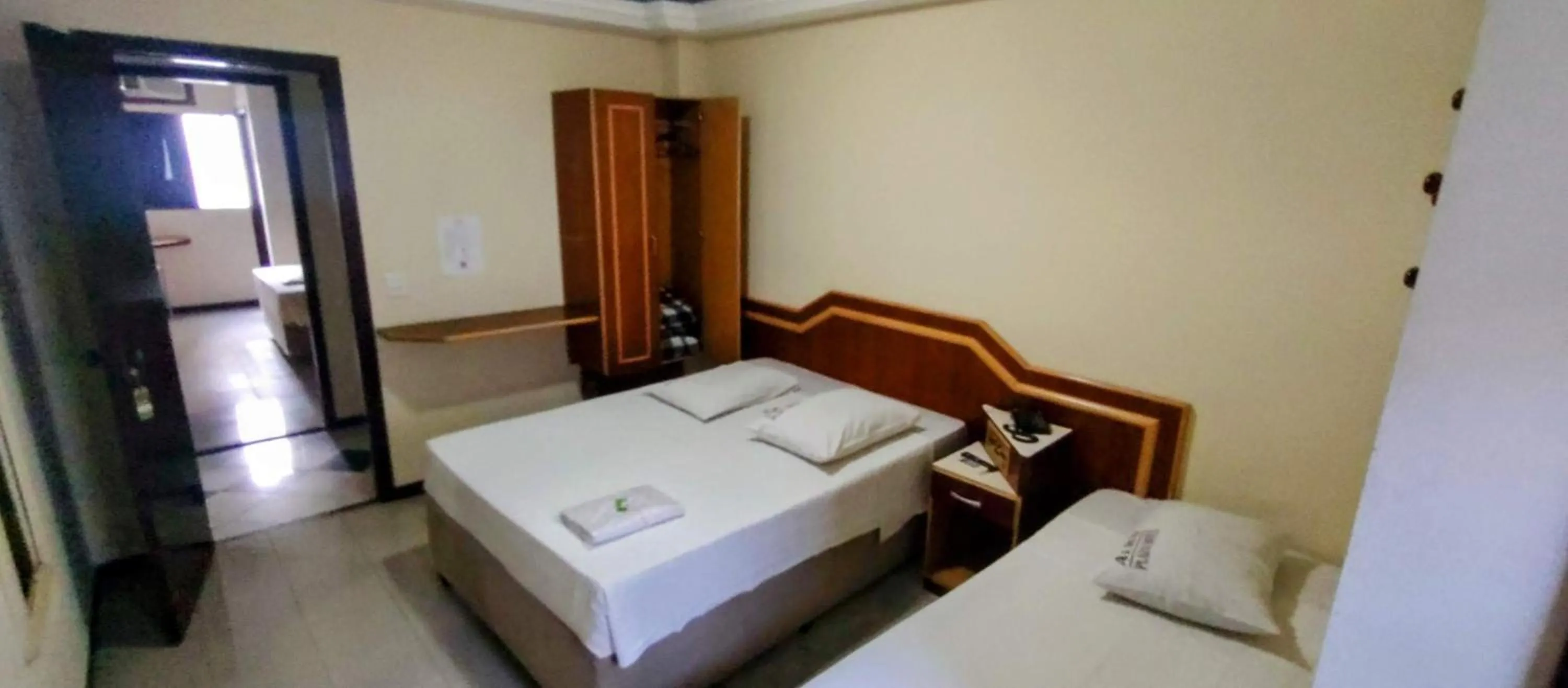 Bed in Aero Plaza Hotel
