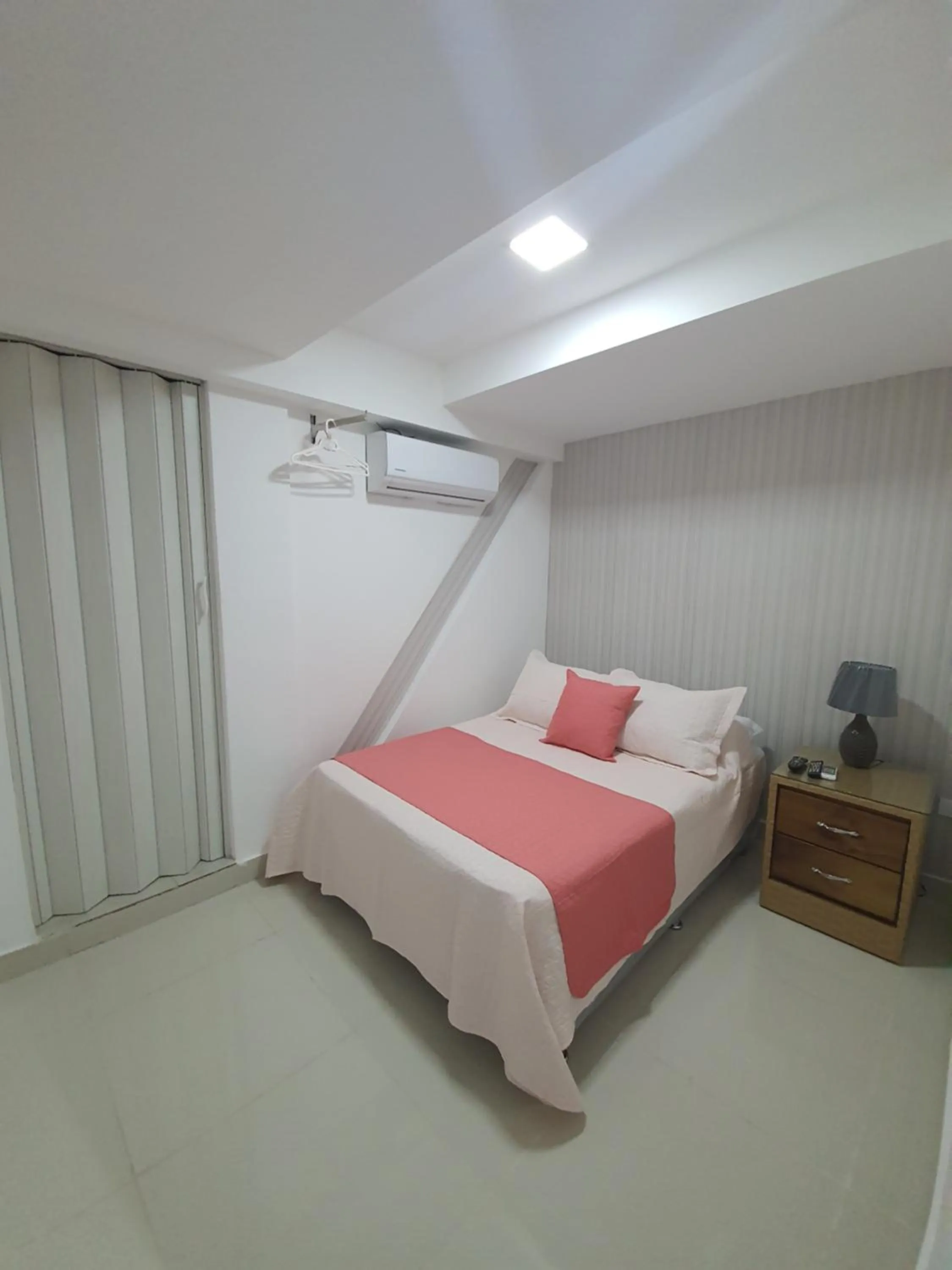 Bed in Malecon Premium Rooms & Hotel