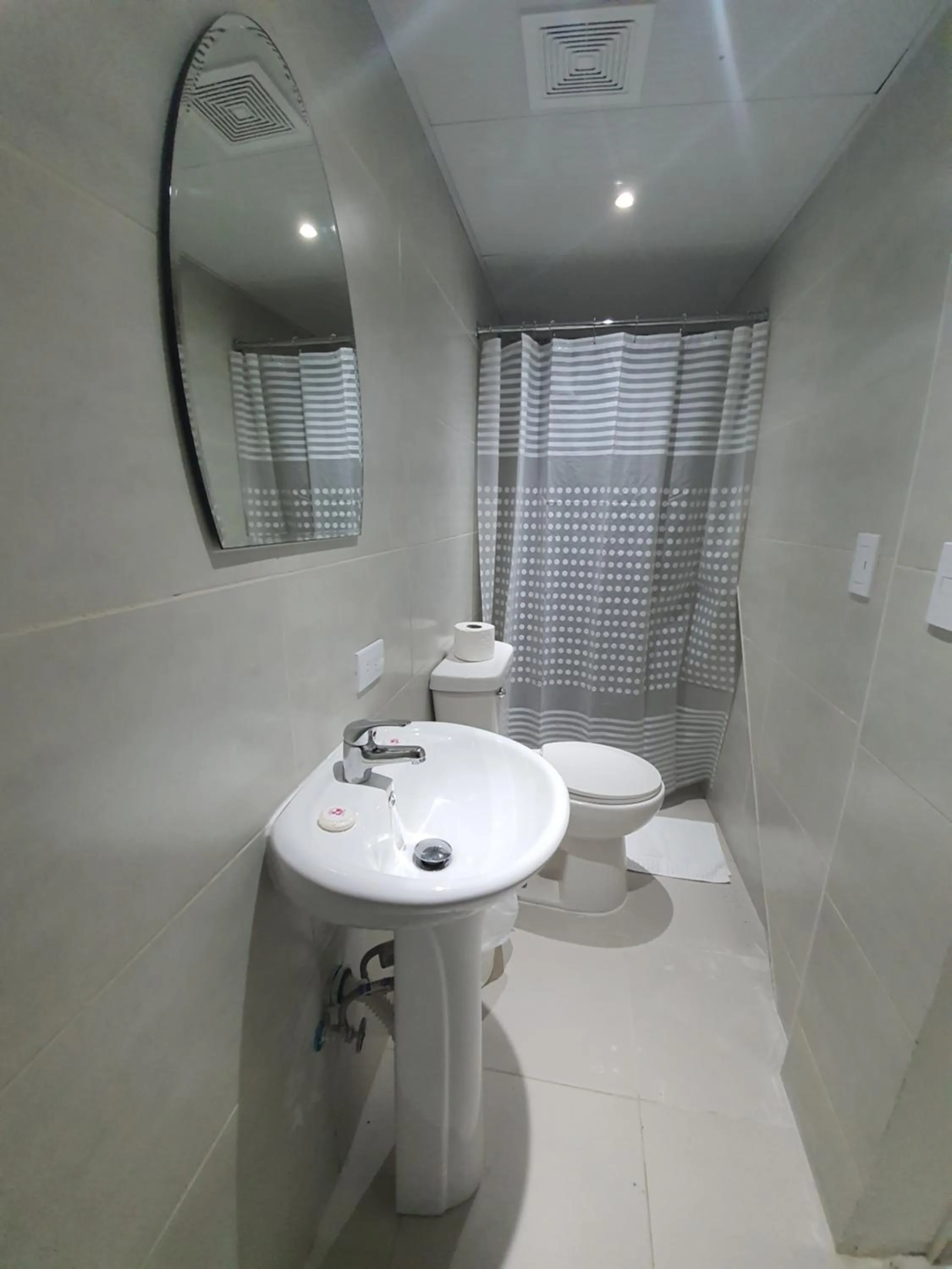 Bathroom in Malecon Premium Rooms & Hotel