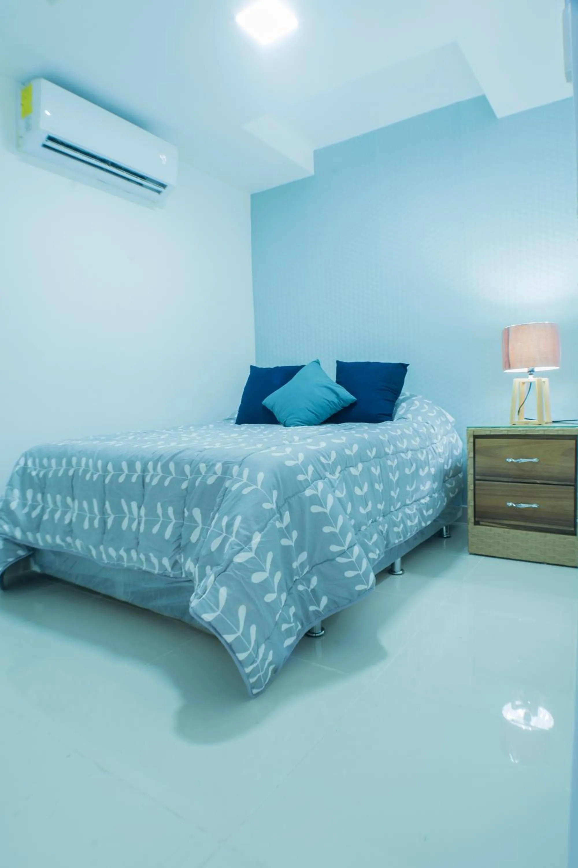 Bed in Malecon Premium Rooms & Hotel