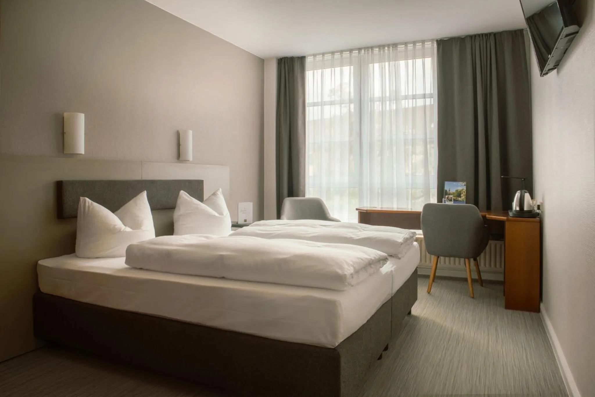 Photo of the whole room, Bed in SensCity Hotel Berlin Spandau
