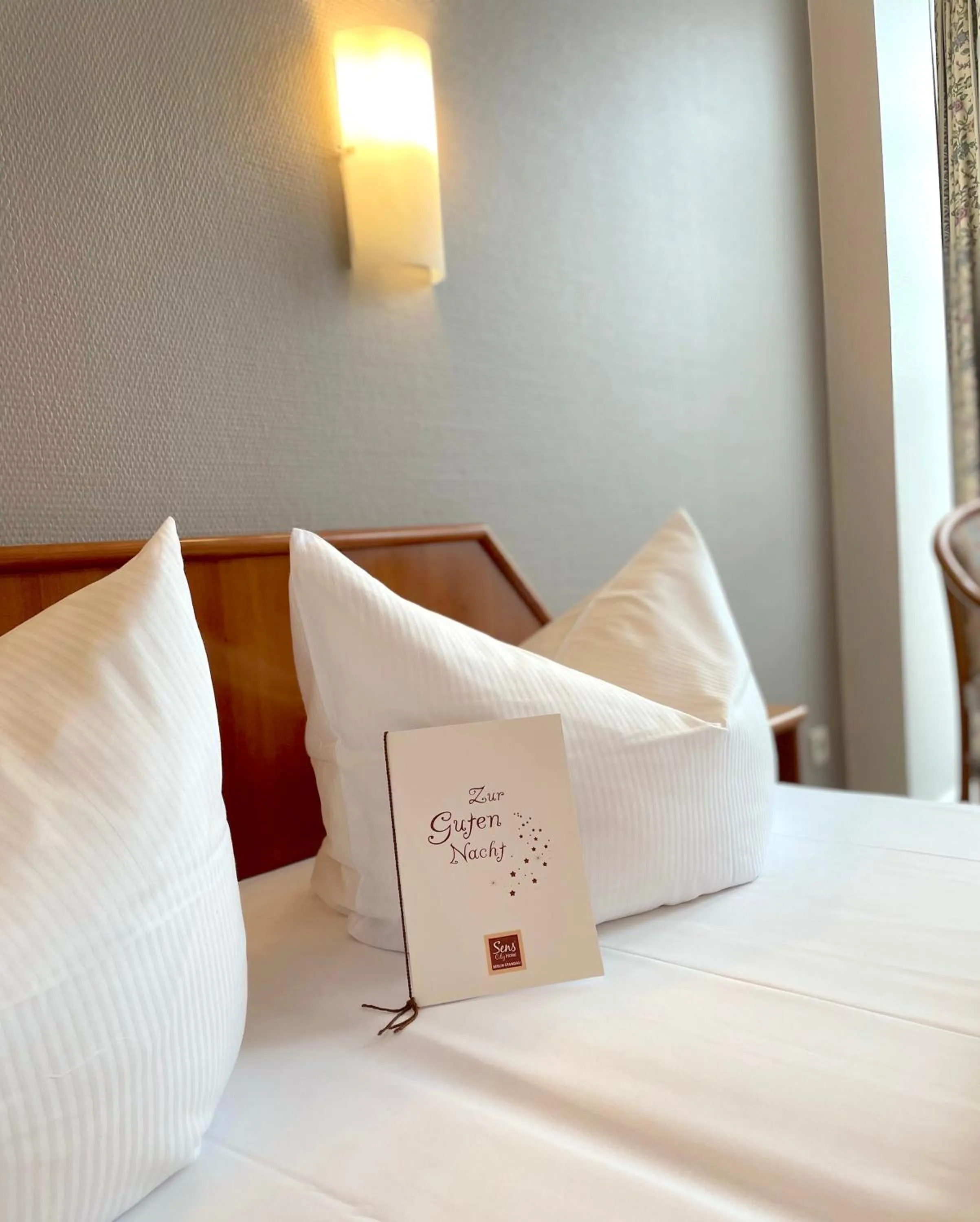 Bed in SensCity Hotel Berlin Spandau