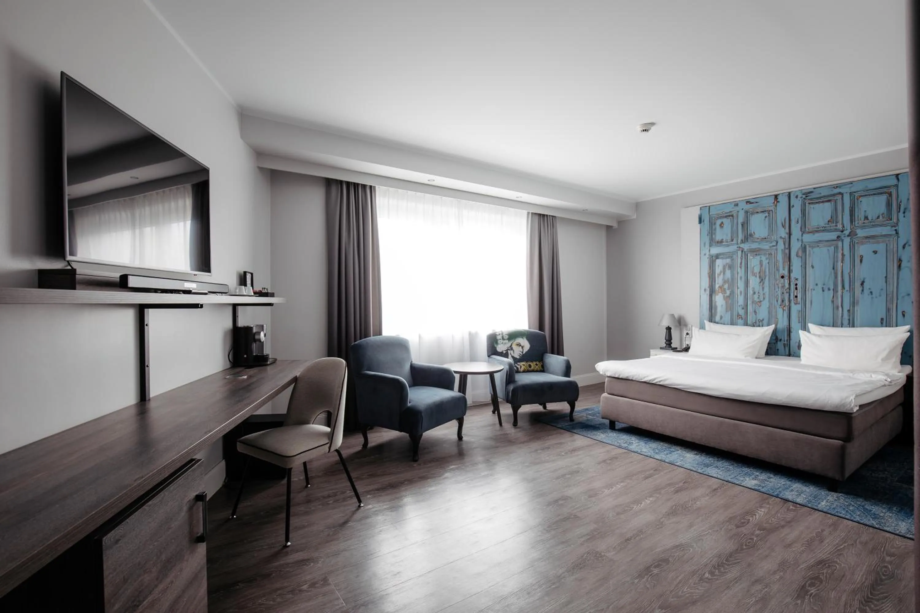 Seating area, Bed in Hotel Berlin, Berlin, a member of Radisson Individuals