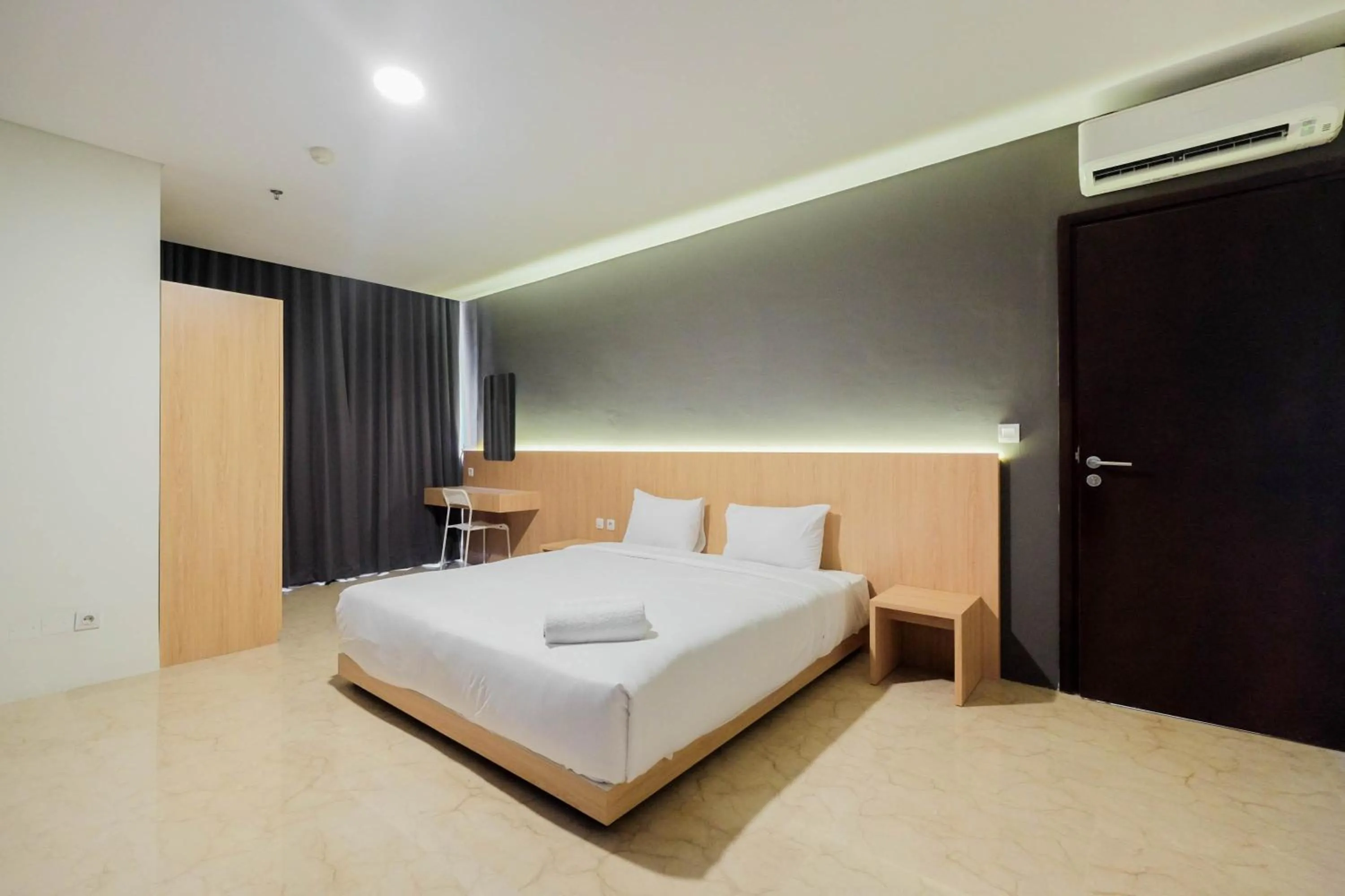 Bedroom, Bed in Comfy 3BR at L'Avenue Apartment Pancoran By Travelio