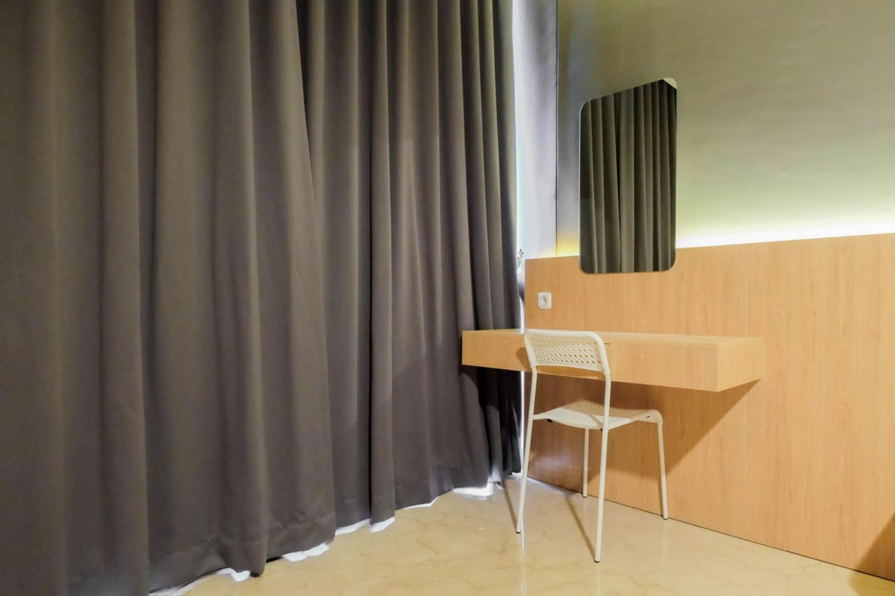 Bedroom in Comfy 3BR at L'Avenue Apartment Pancoran By Travelio