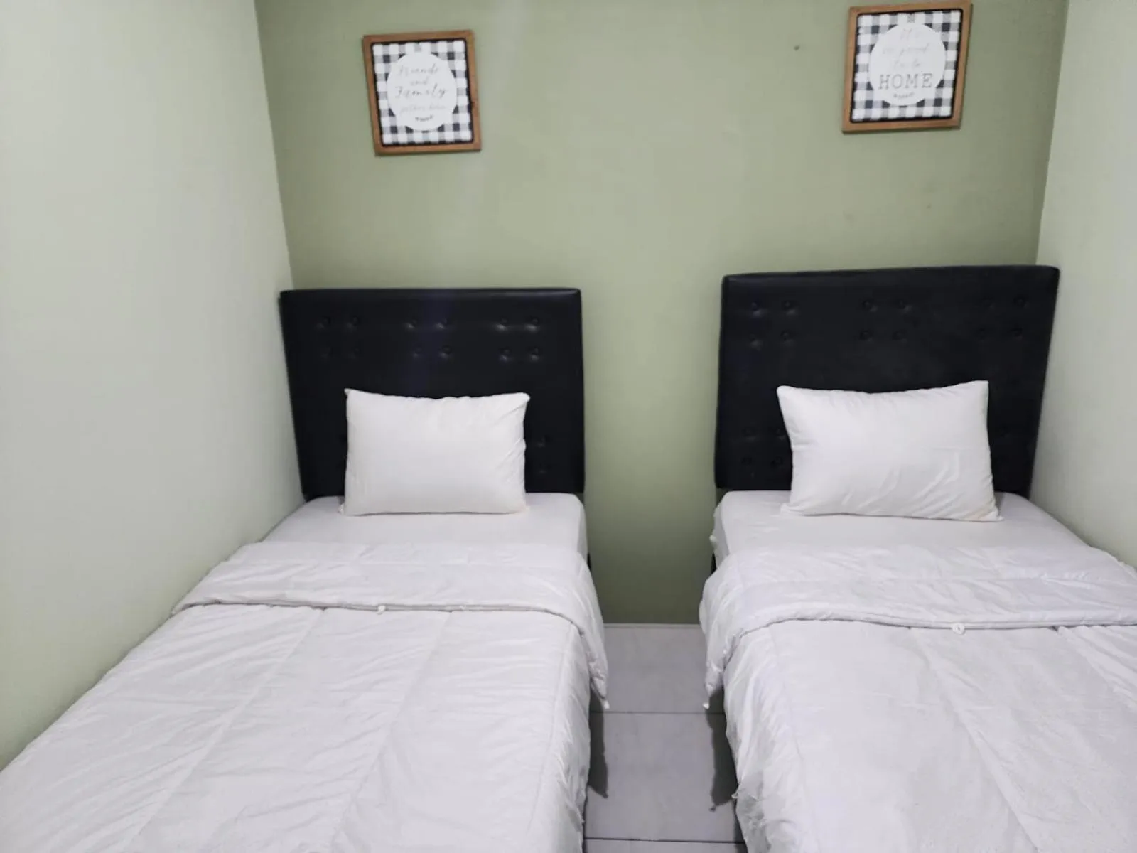 Bed in Omah Pandhoek Family Syariah by Stayku