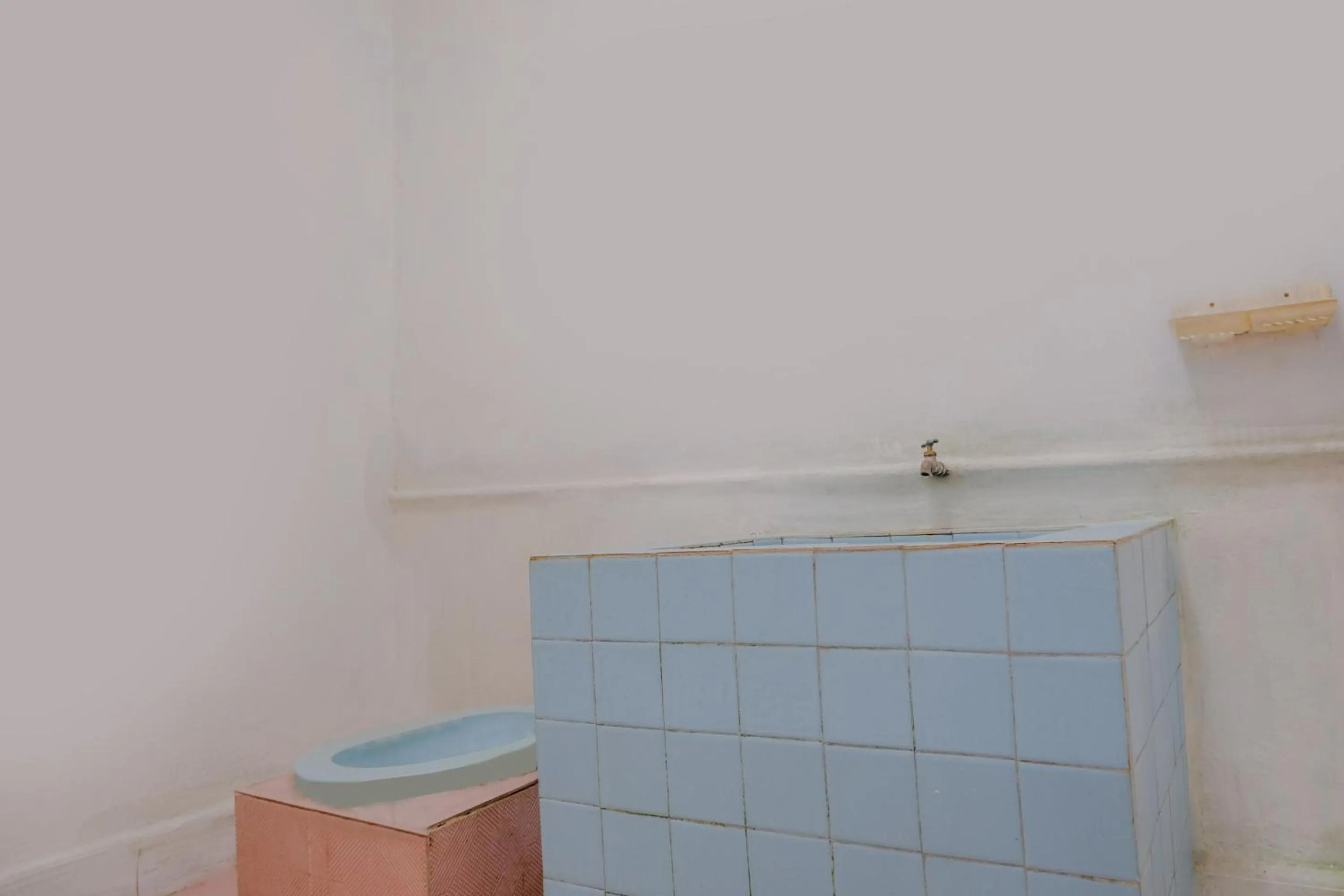 Bathroom in OYO Life 2638 Hotel Raya