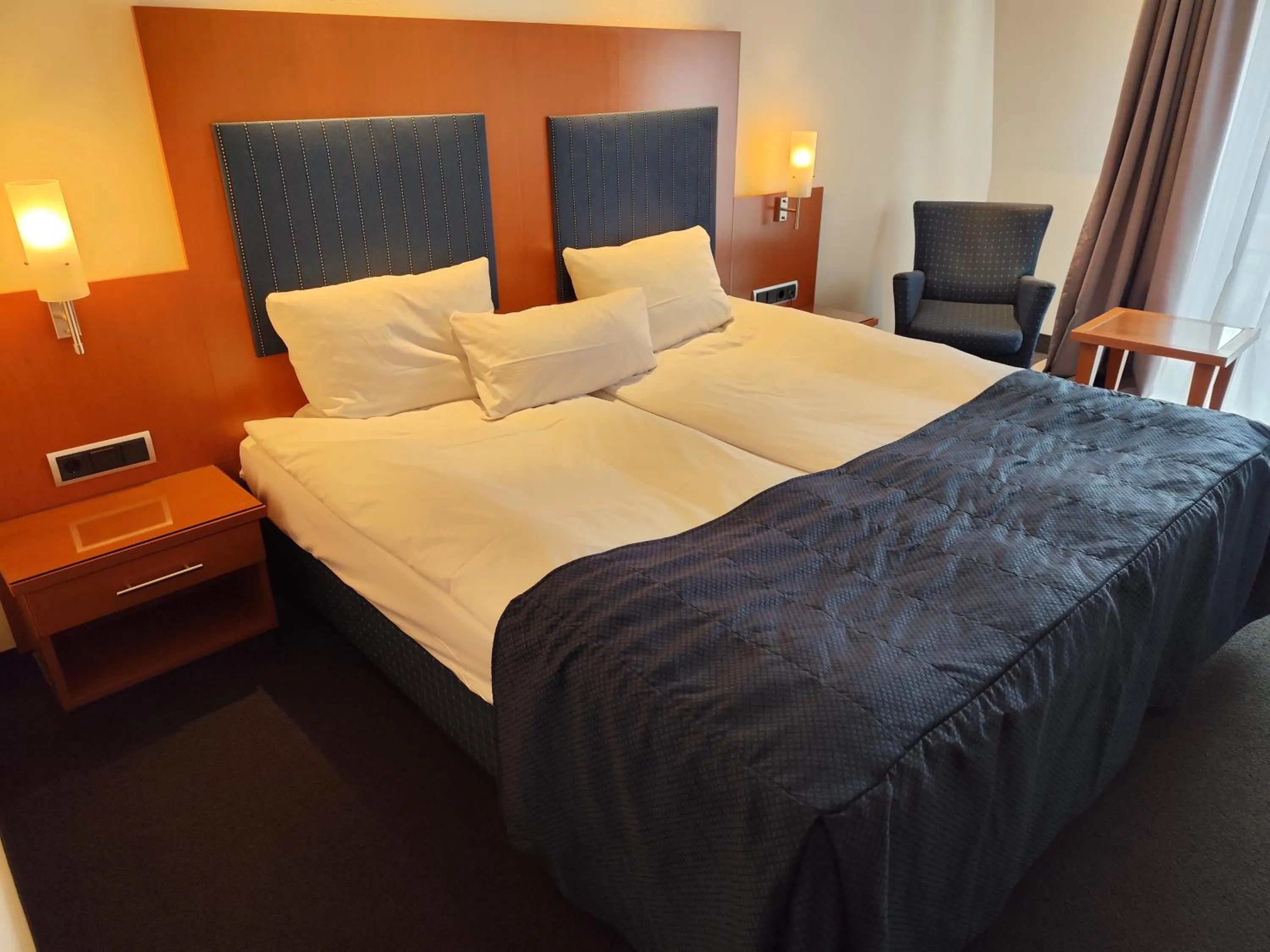 Photo of the whole room, Bed in Hotel Erzgiesserei Europe