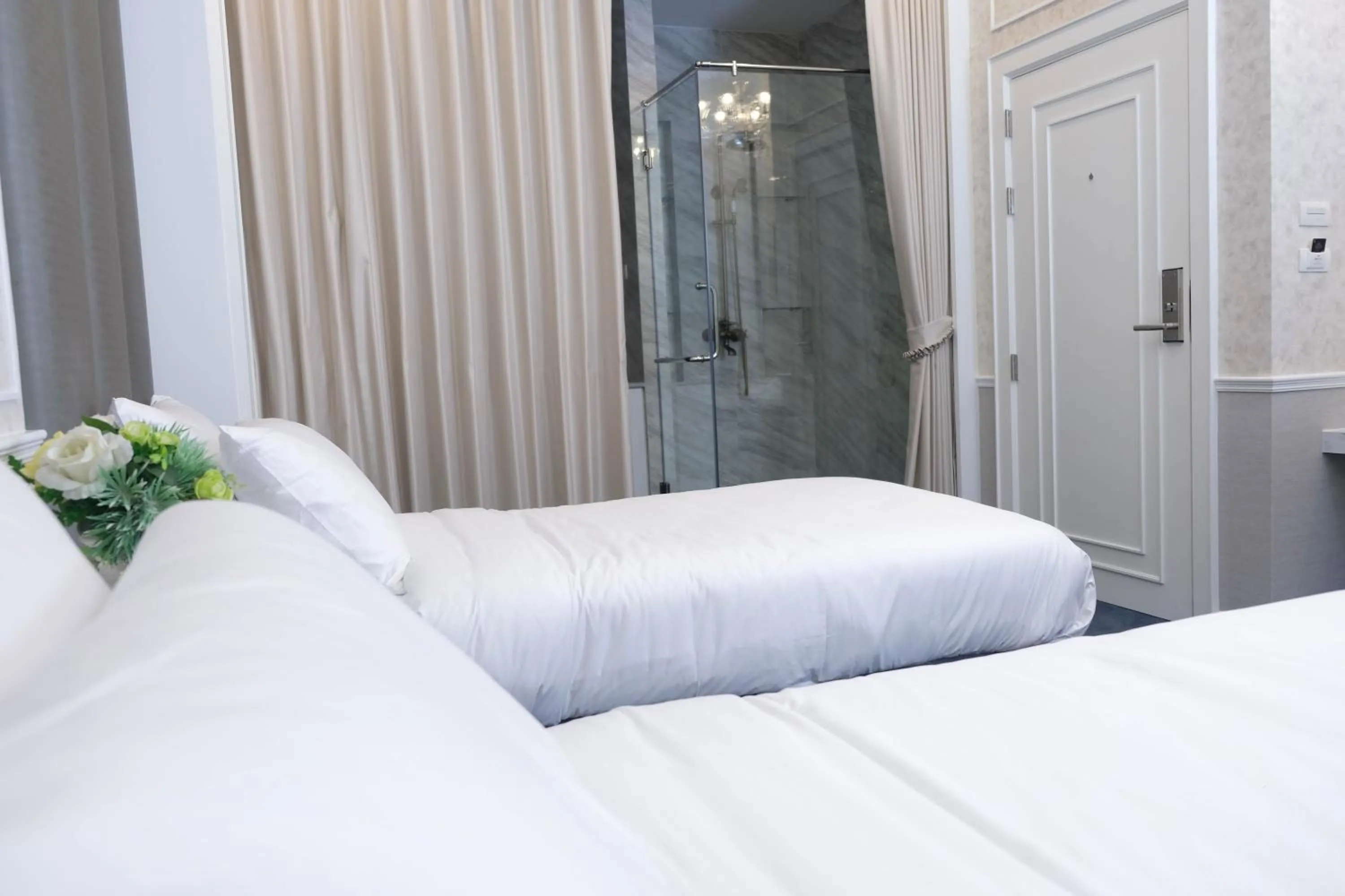 Shower, Bed in VARIMANTRA HOTEL