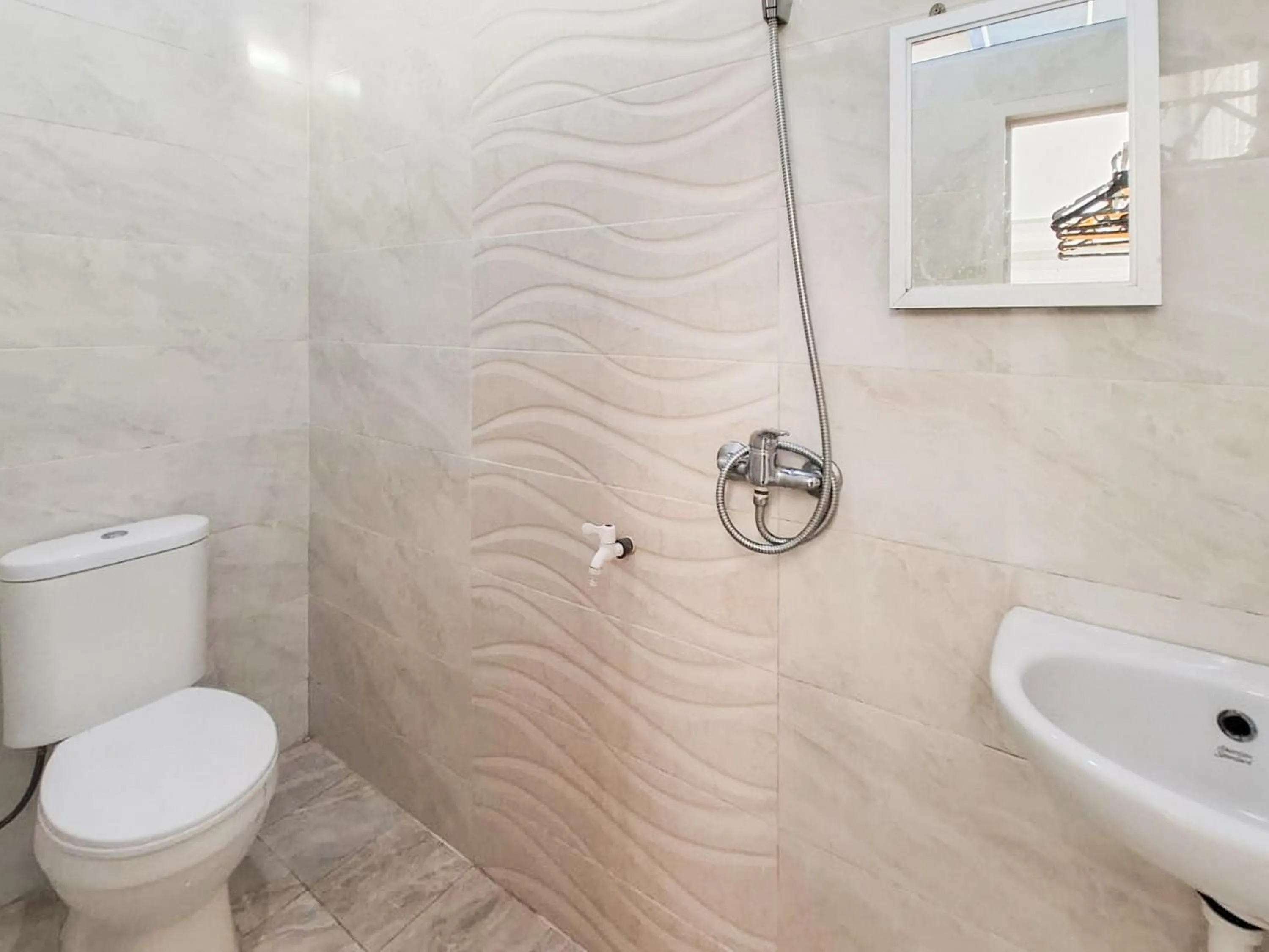 Bathroom in RedDoorz Syariah near Tanjung Pinang City Center