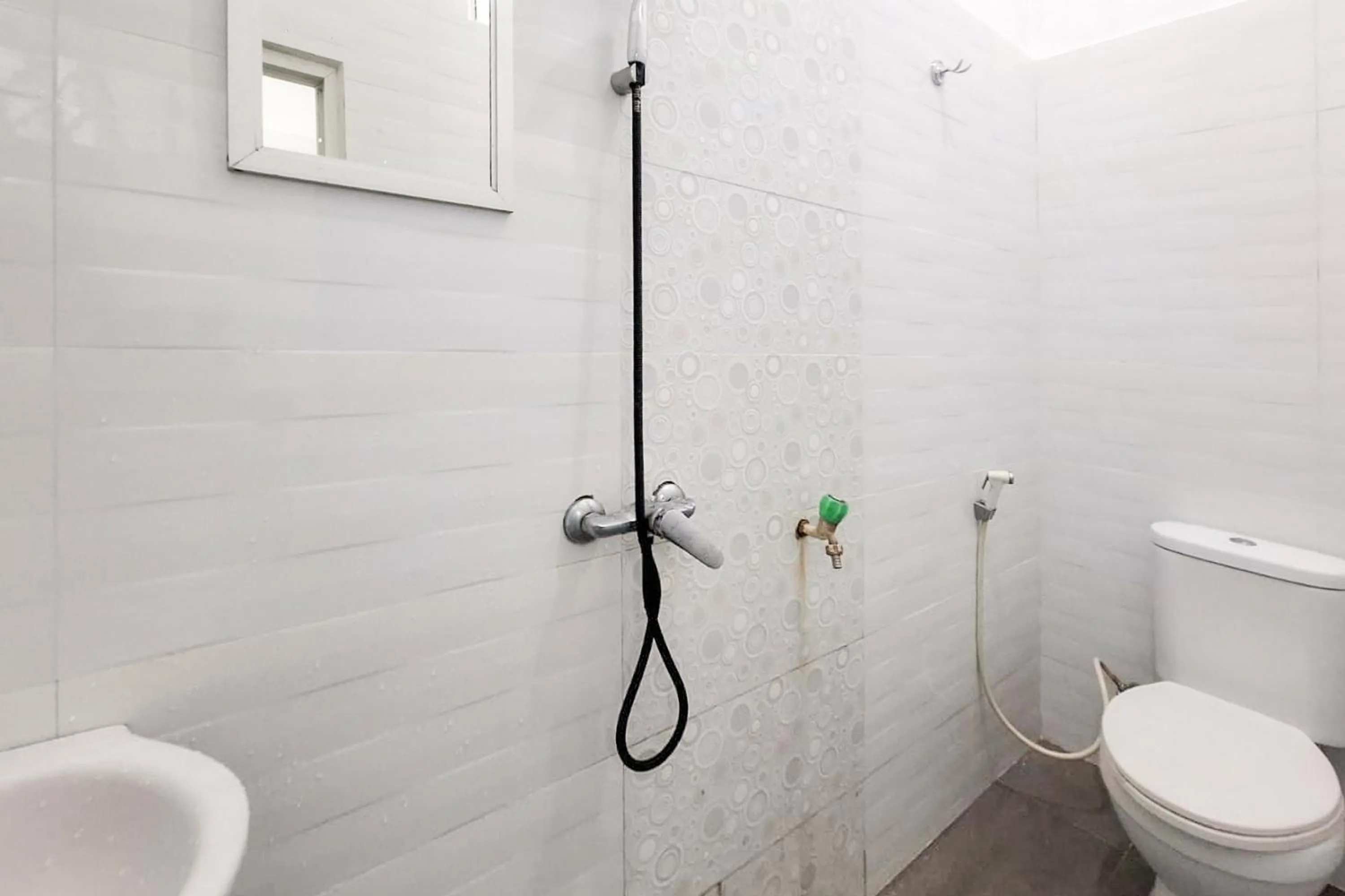 Bathroom in RedDoorz Syariah near Tanjung Pinang City Center