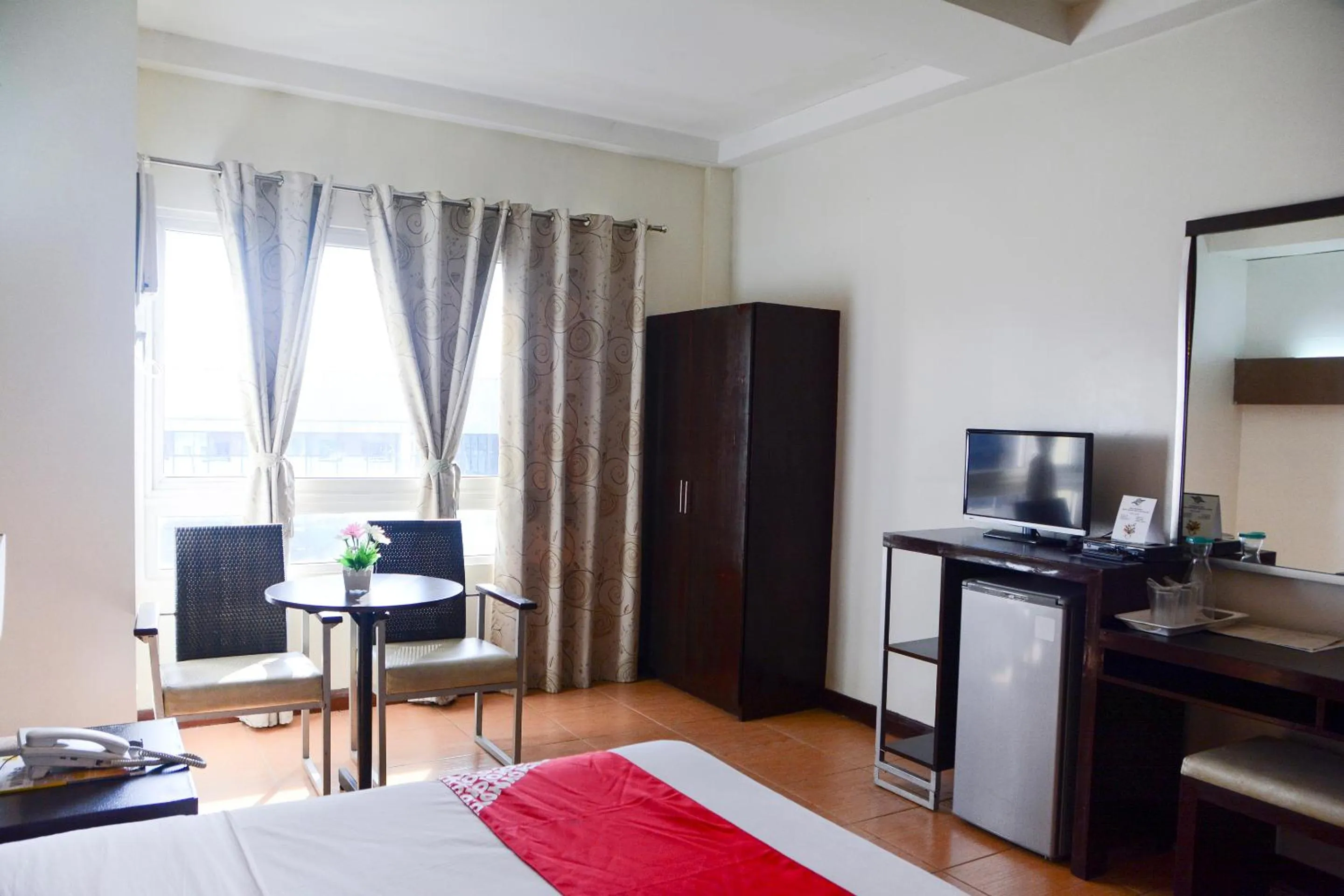 Photo of the whole room, Bed in East View Hotel