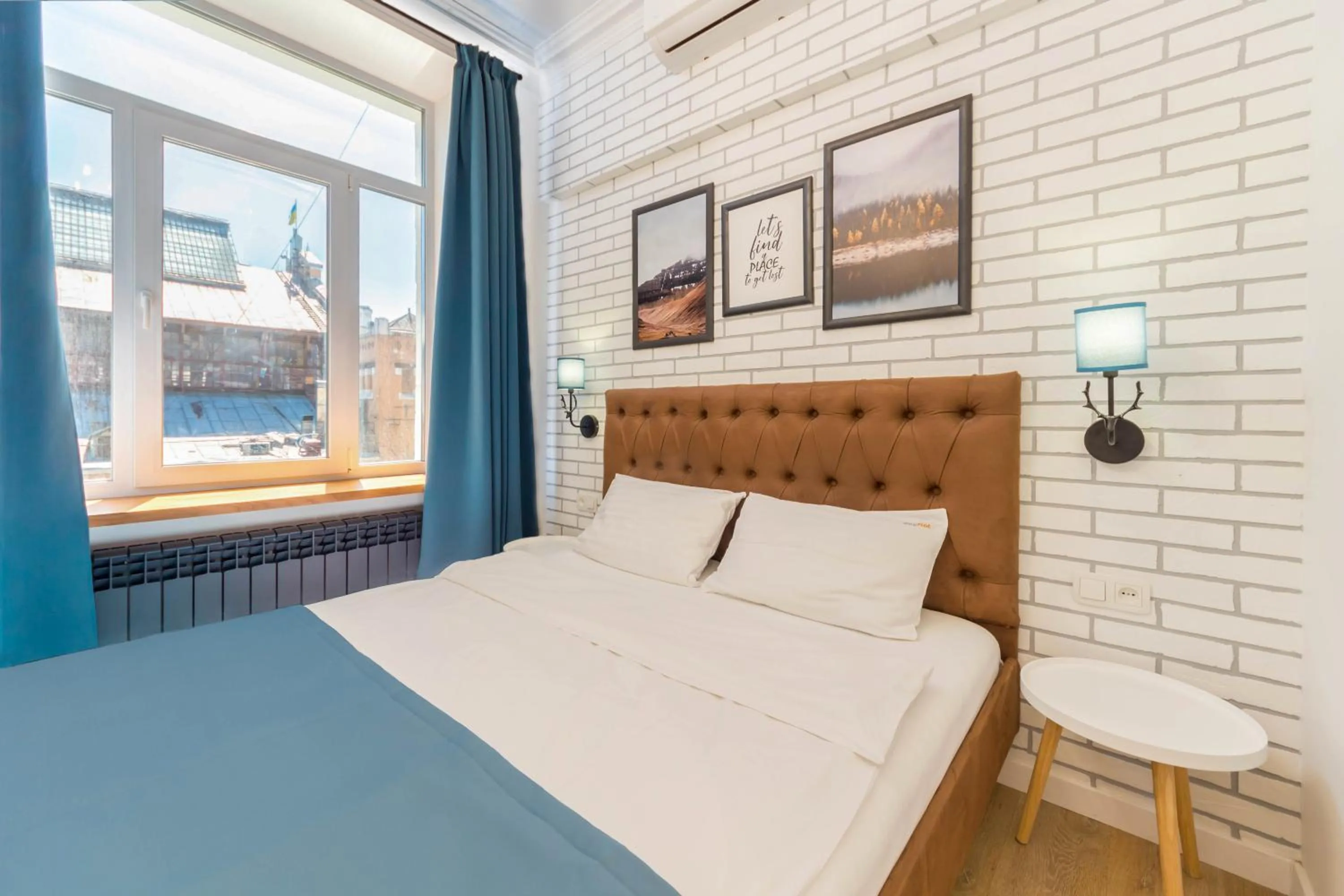 Bed in Scandinavian Apartments