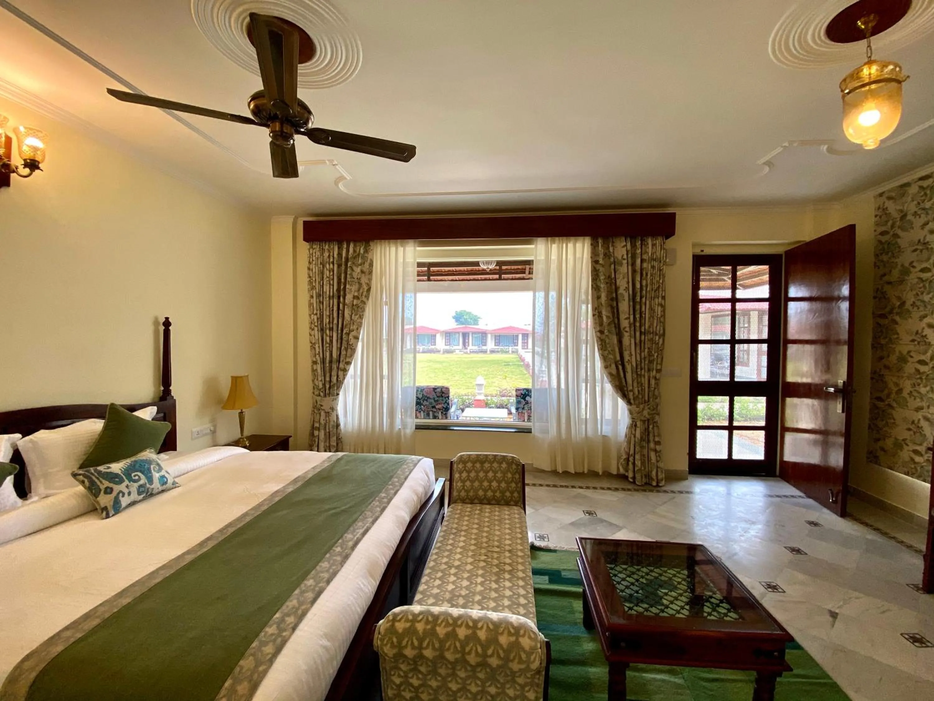 Bed in Sariska Safari Lodge