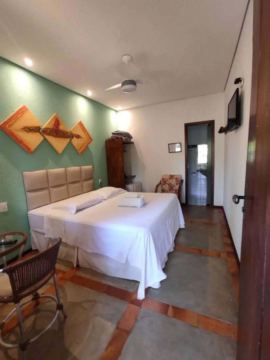 Photo of the whole room, Bed in Pousada Banana Cipó