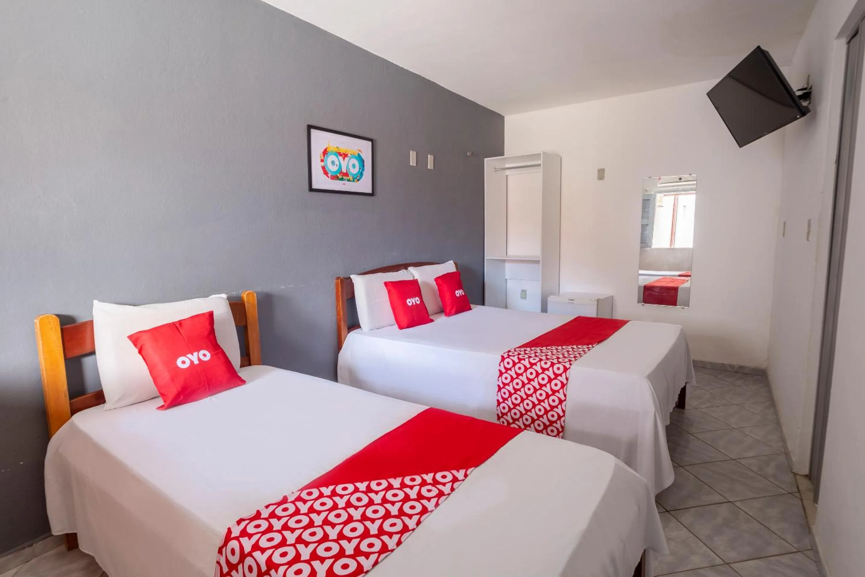 Bed in OYO Pousada Horizonte