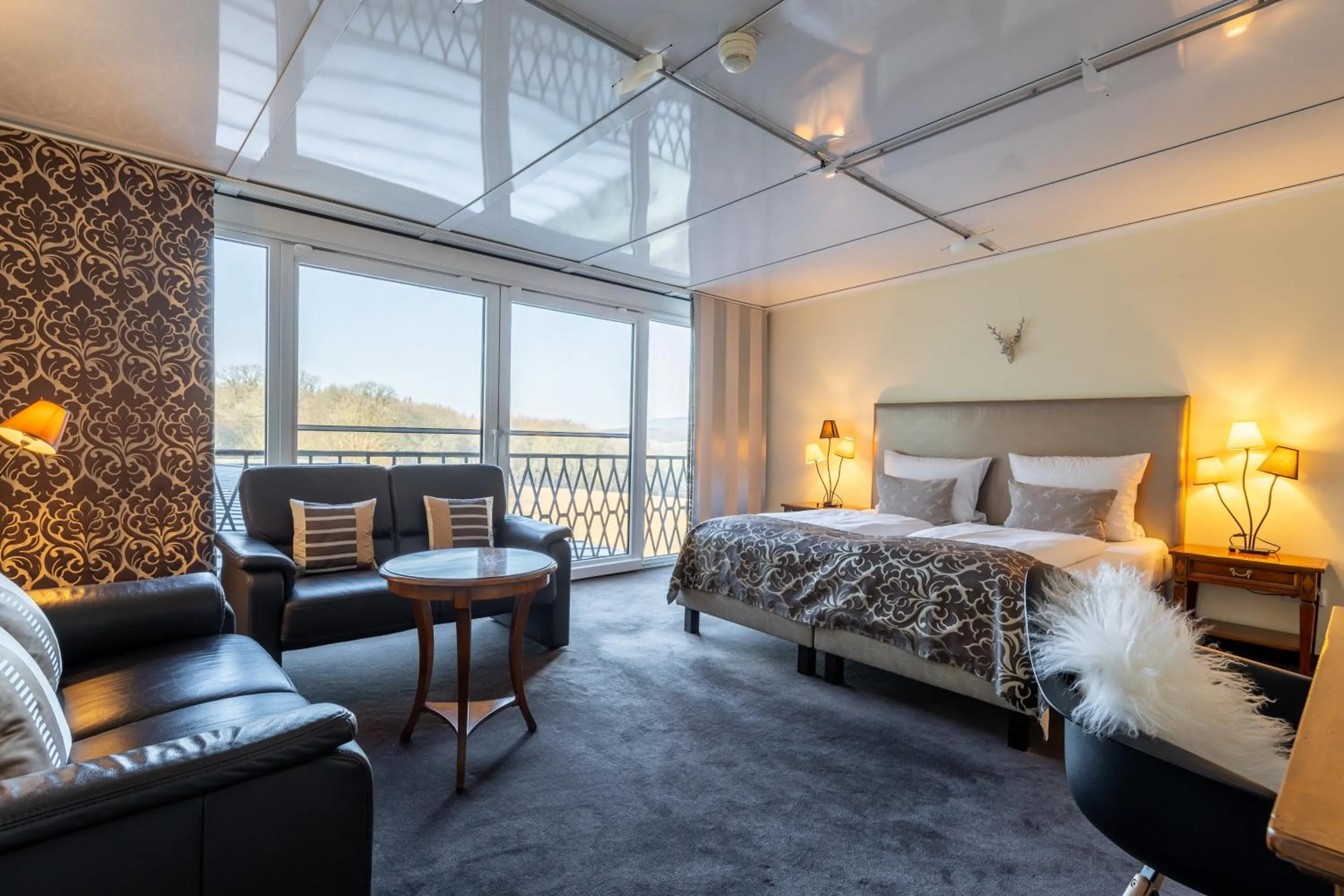 Photo of the whole room, Bed in Jagdschloss Hotel Niederwald