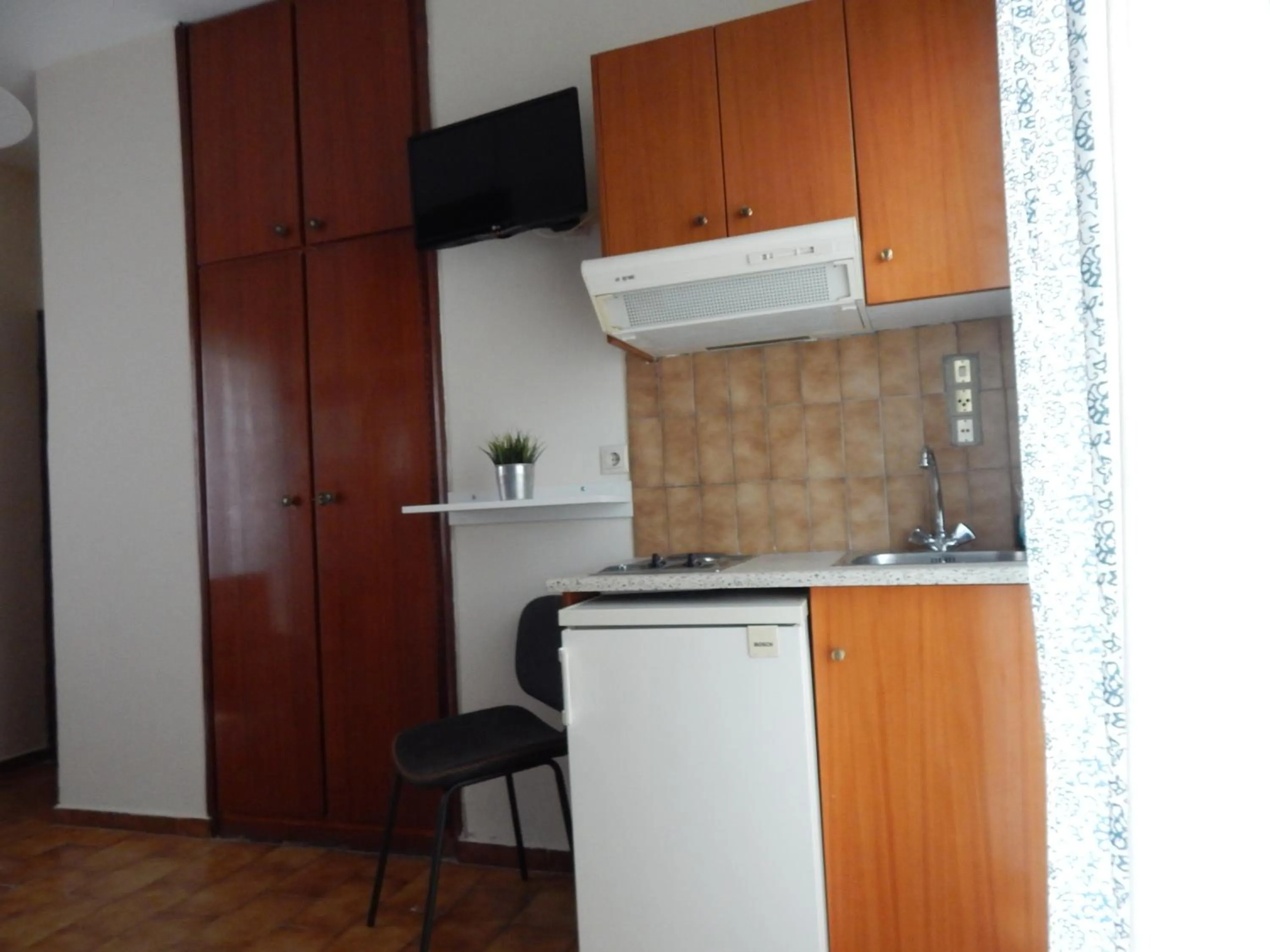 Kitchen or kitchenette in Posidonio Hotel