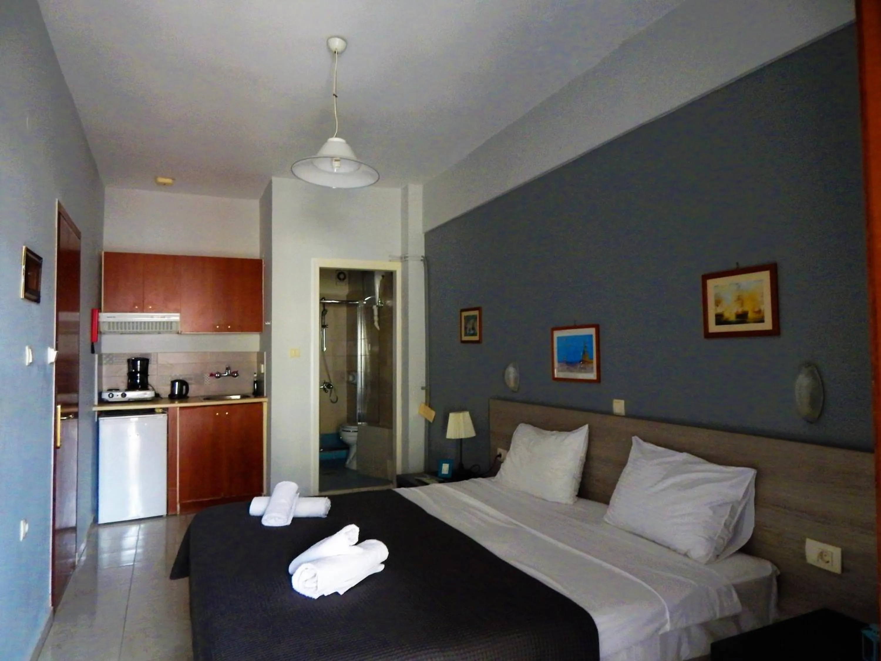 Bed in Posidonio Hotel