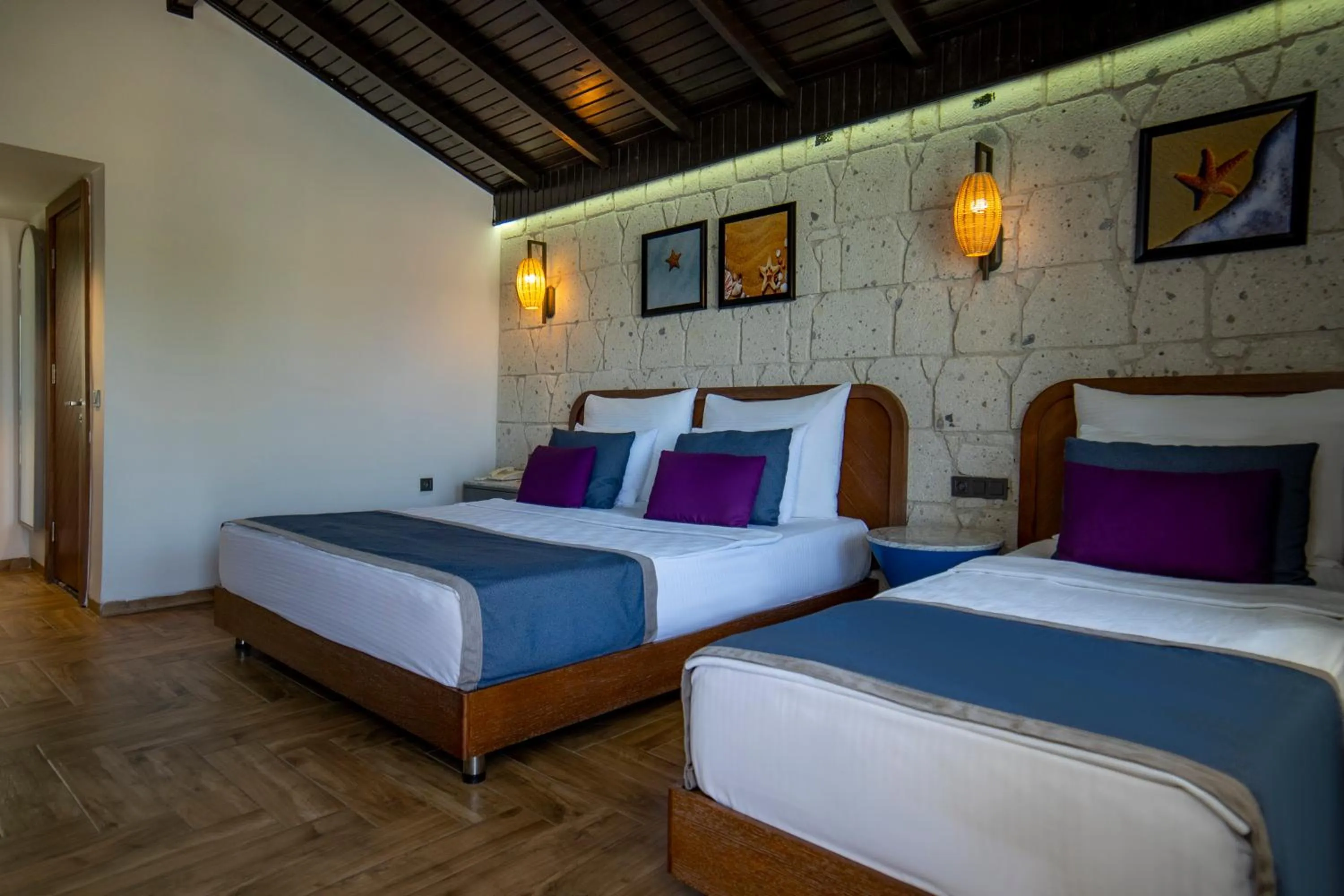 Bed in Risus Beach Resort Hotel