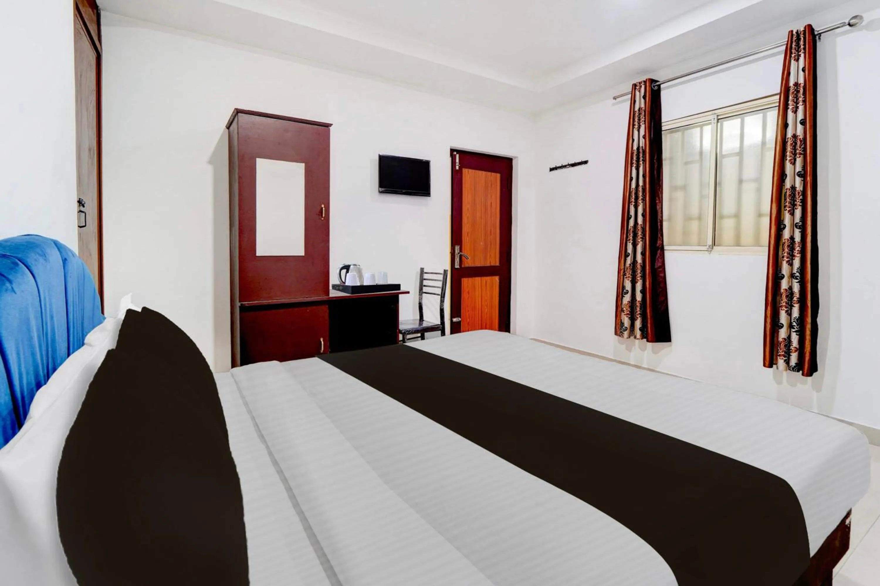Bedroom, Bed in Super Hotel O Kunnamangalam Near Bus Stand