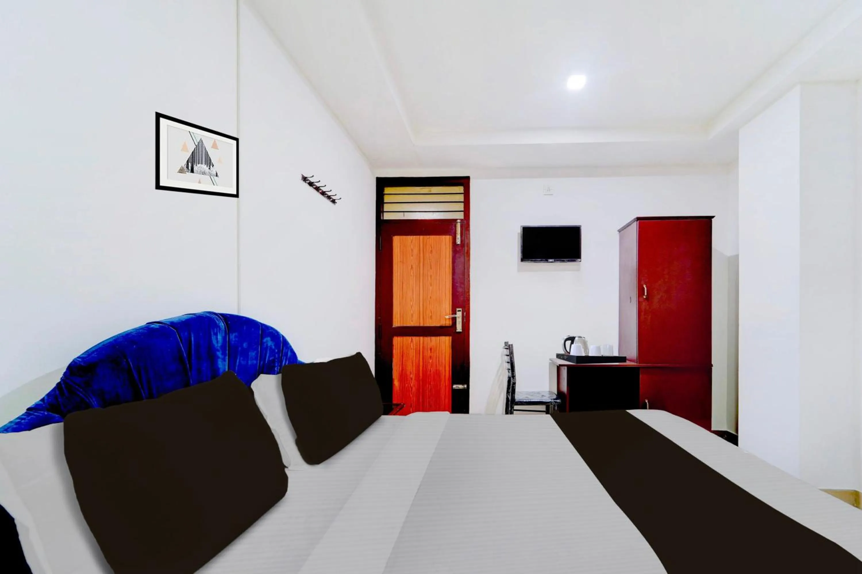 Bedroom, Bed in Super Hotel O Kunnamangalam Near Bus Stand