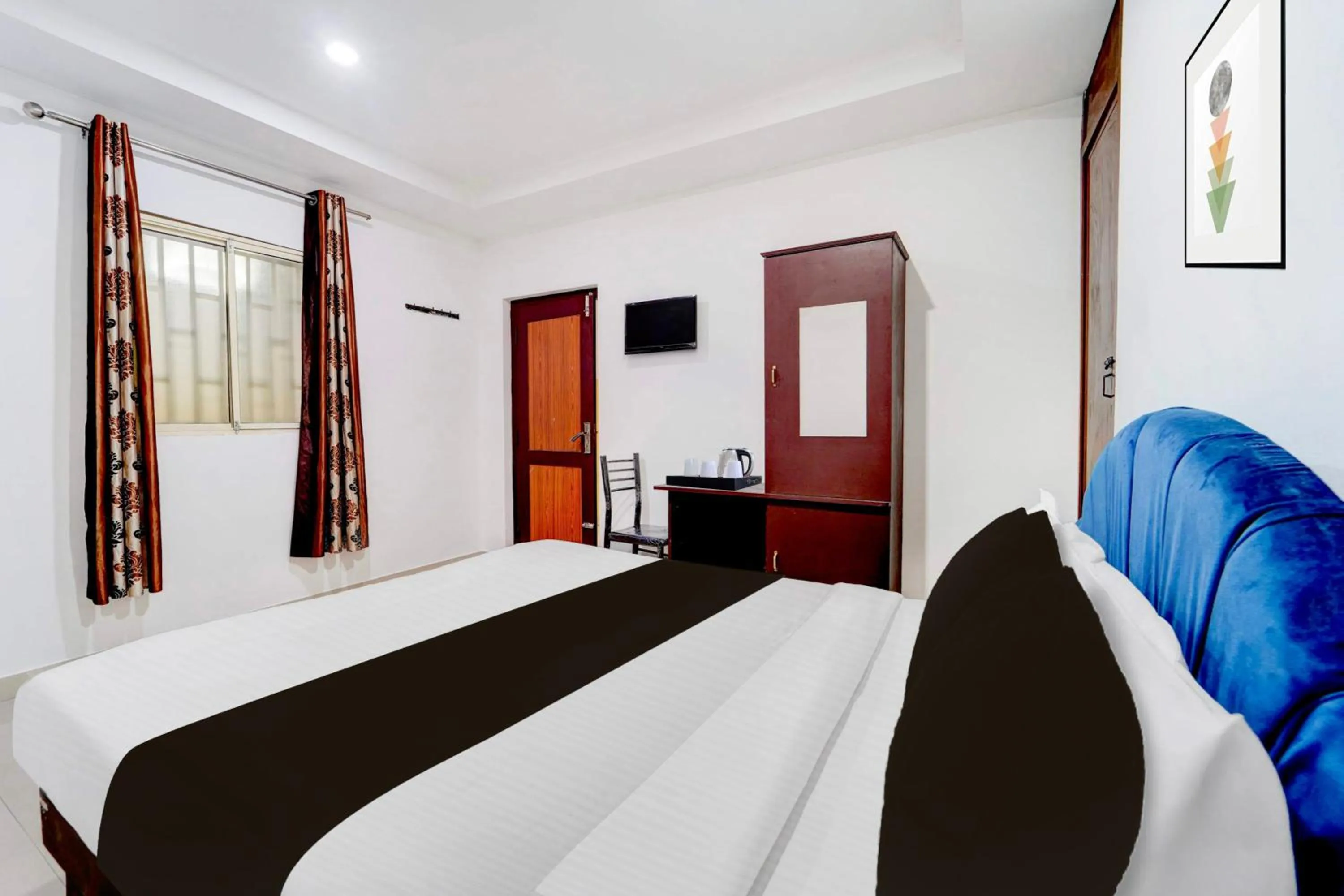 Bedroom, Bed in Super Hotel O Kunnamangalam Near Bus Stand