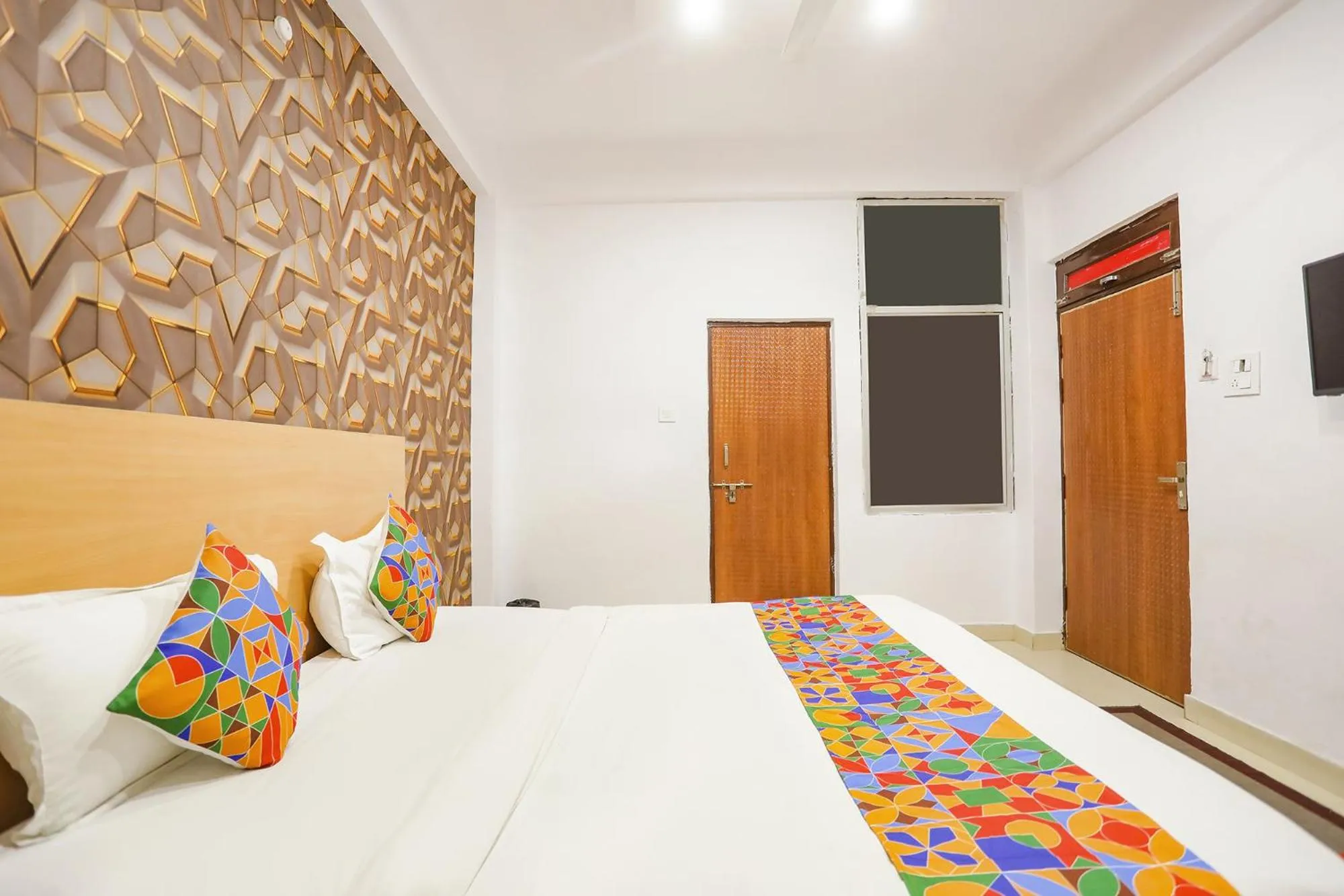 Bed in FabHotel Pranjul Inn