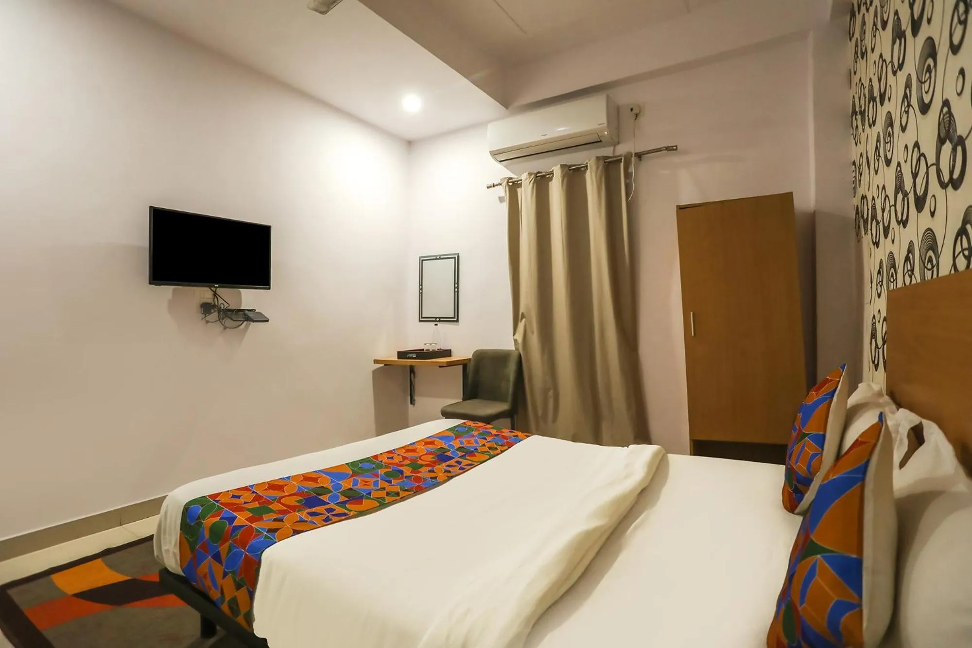 Bed in FabHotel Pranjul Inn