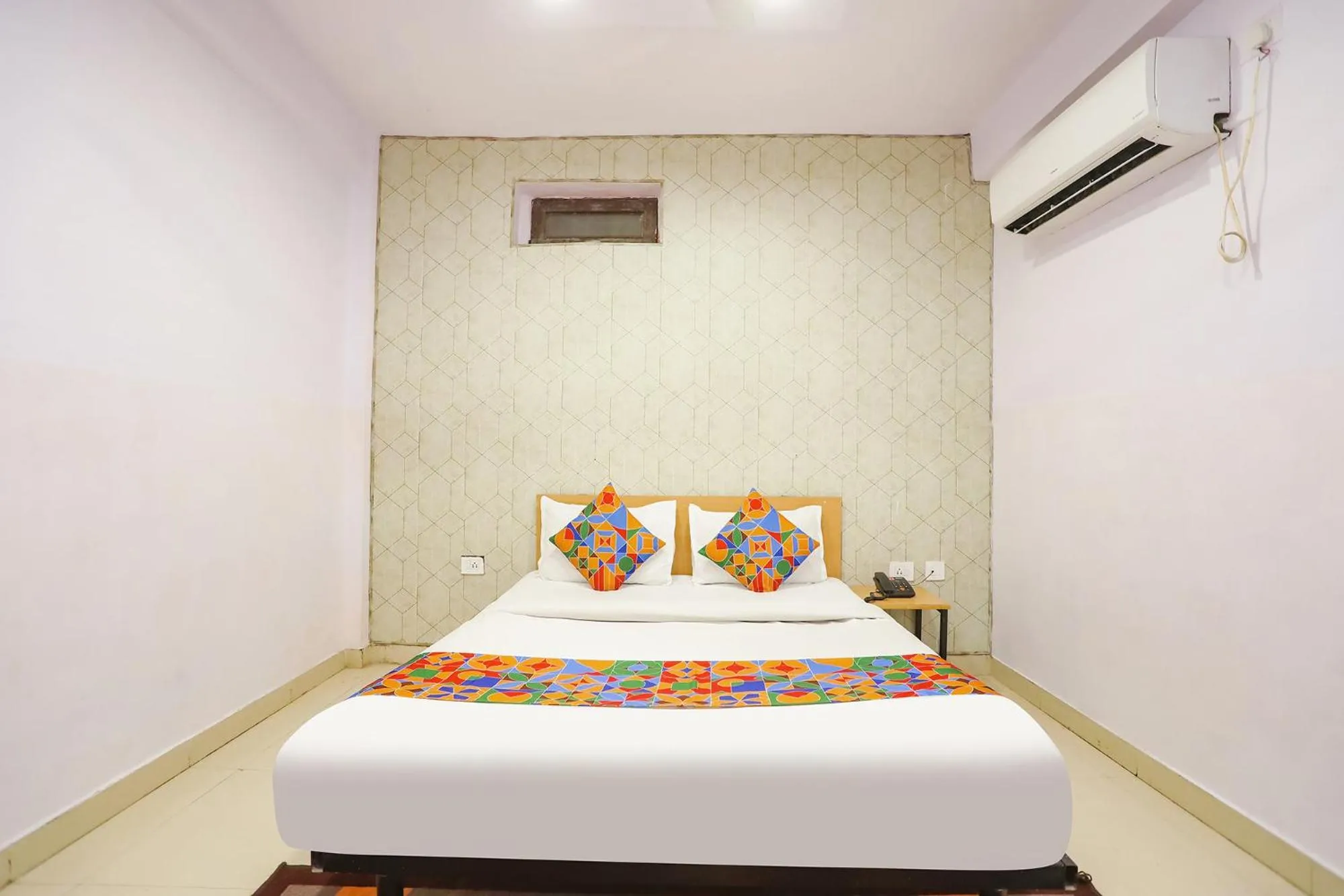 Bed in FabHotel Pranjul Inn