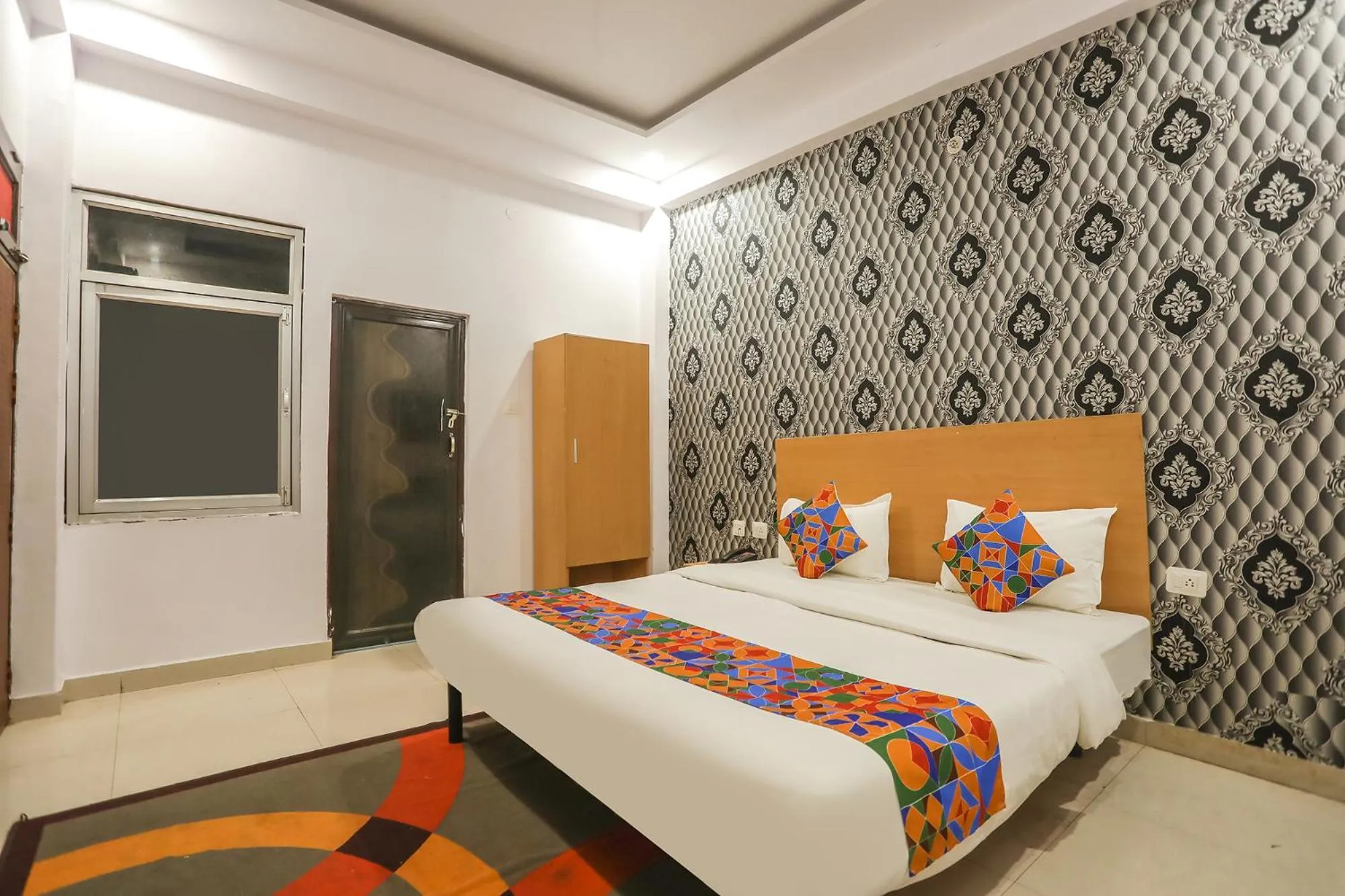 Bed in FabHotel Pranjul Inn