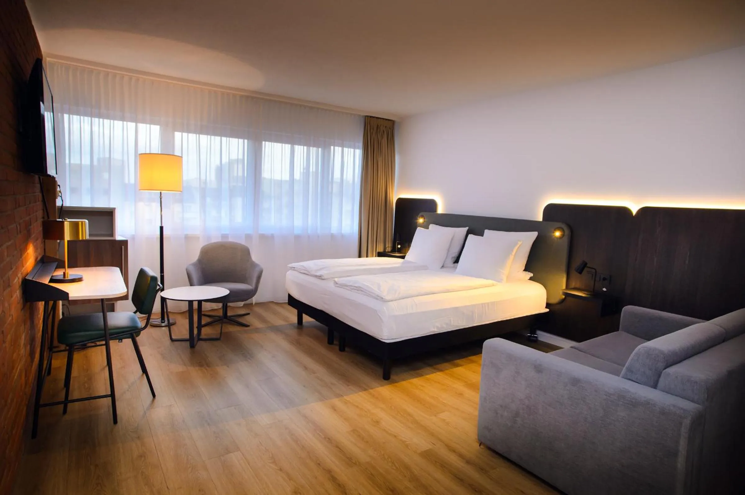 Photo of the whole room, Bed in Tulip Inn Ludwigshafen City