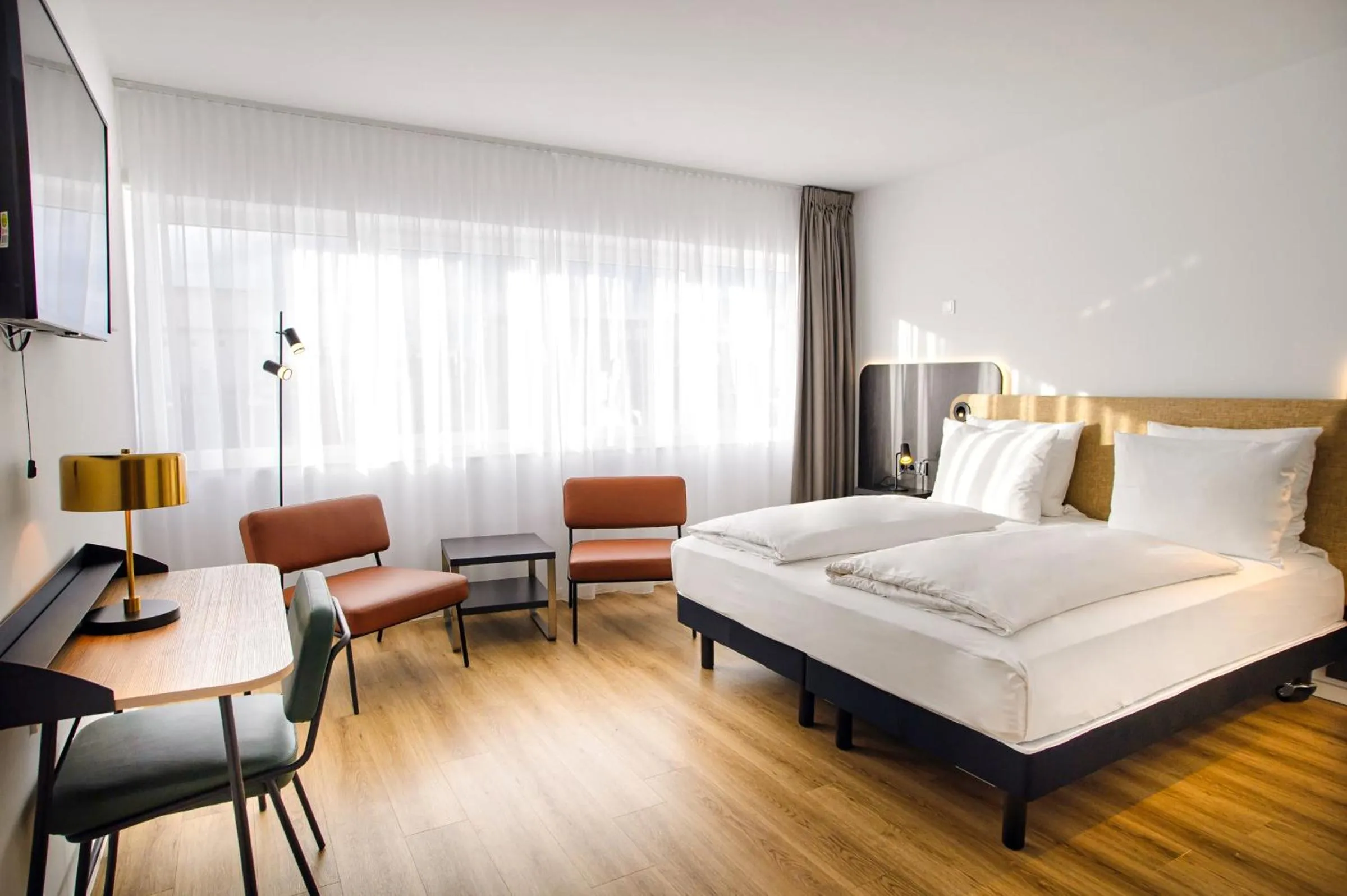 Junior Suite with Two Single Beds and One Sofa Bed in Tulip Inn Ludwigshafen City