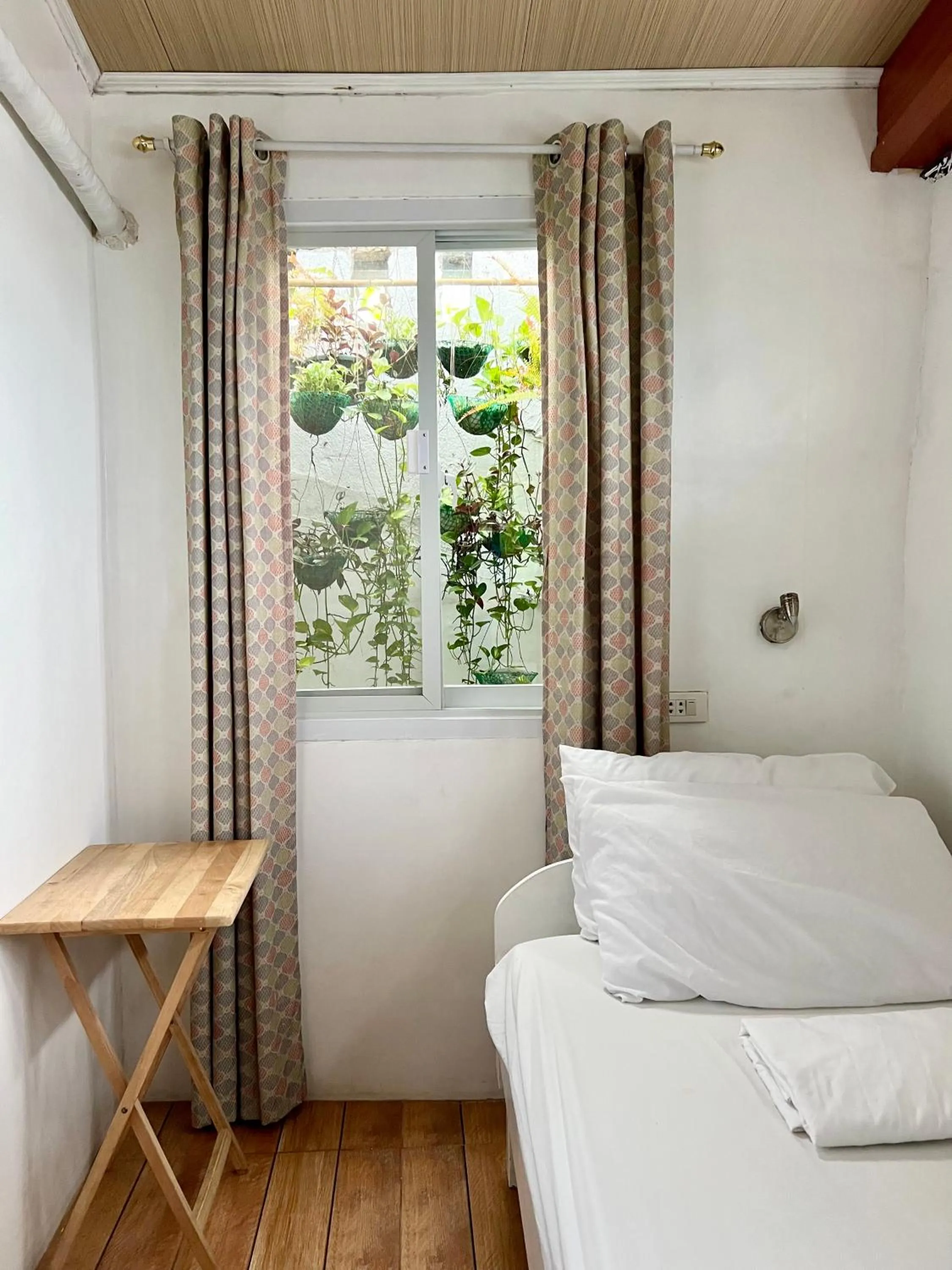 Bed in Balai Tinay Guesthouse