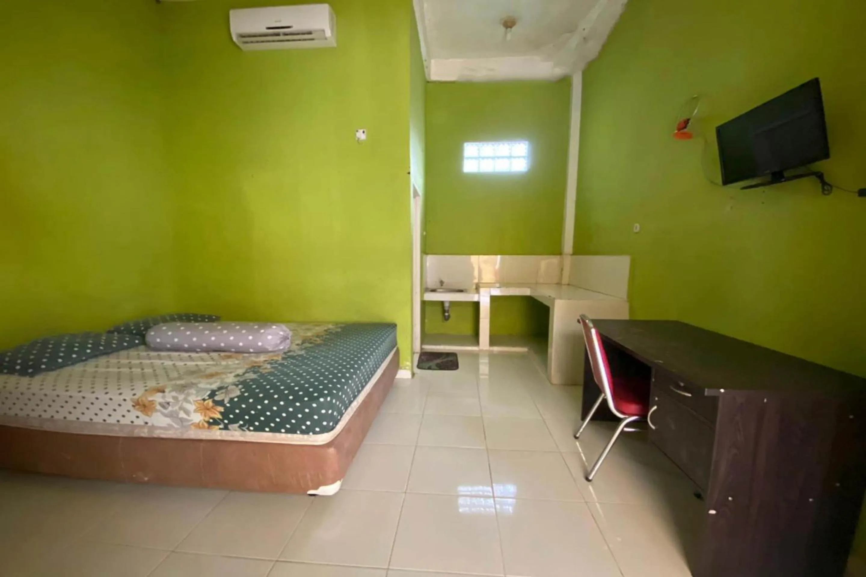 Bedroom, Bed in OYO Life Afny Kost 1