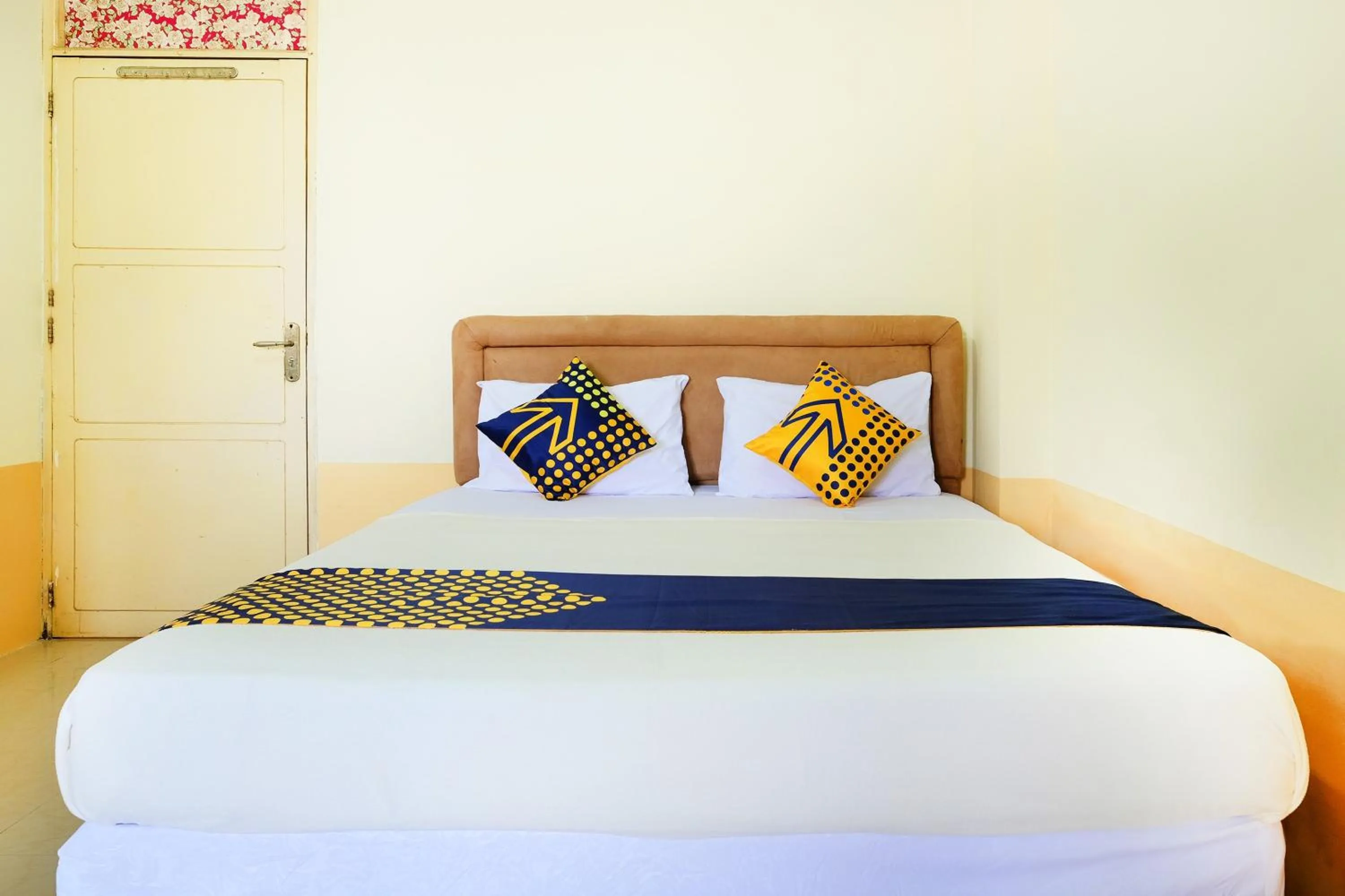 Bedroom in Hotel O Zn Guest House