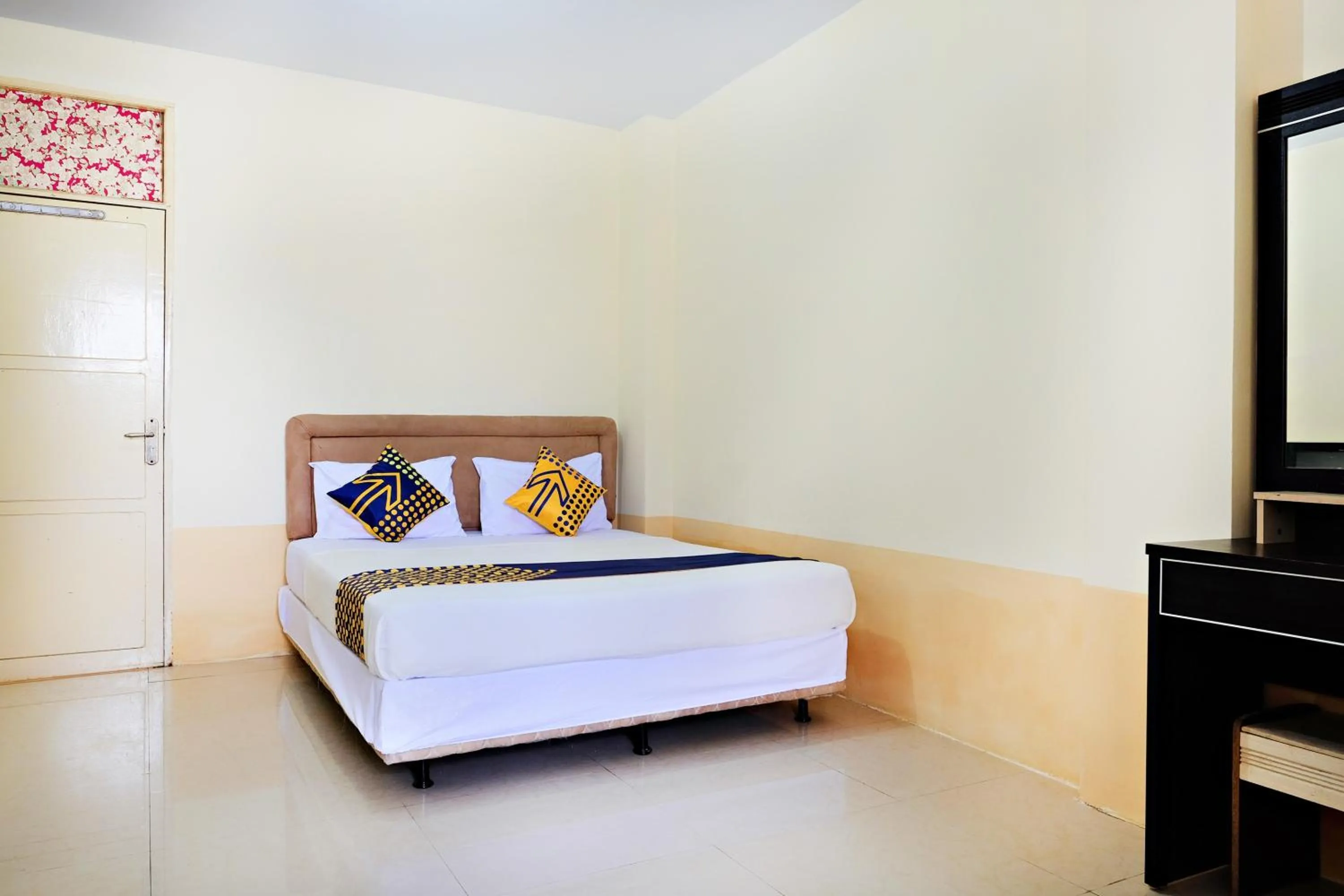 Bedroom in Hotel O Zn Guest House