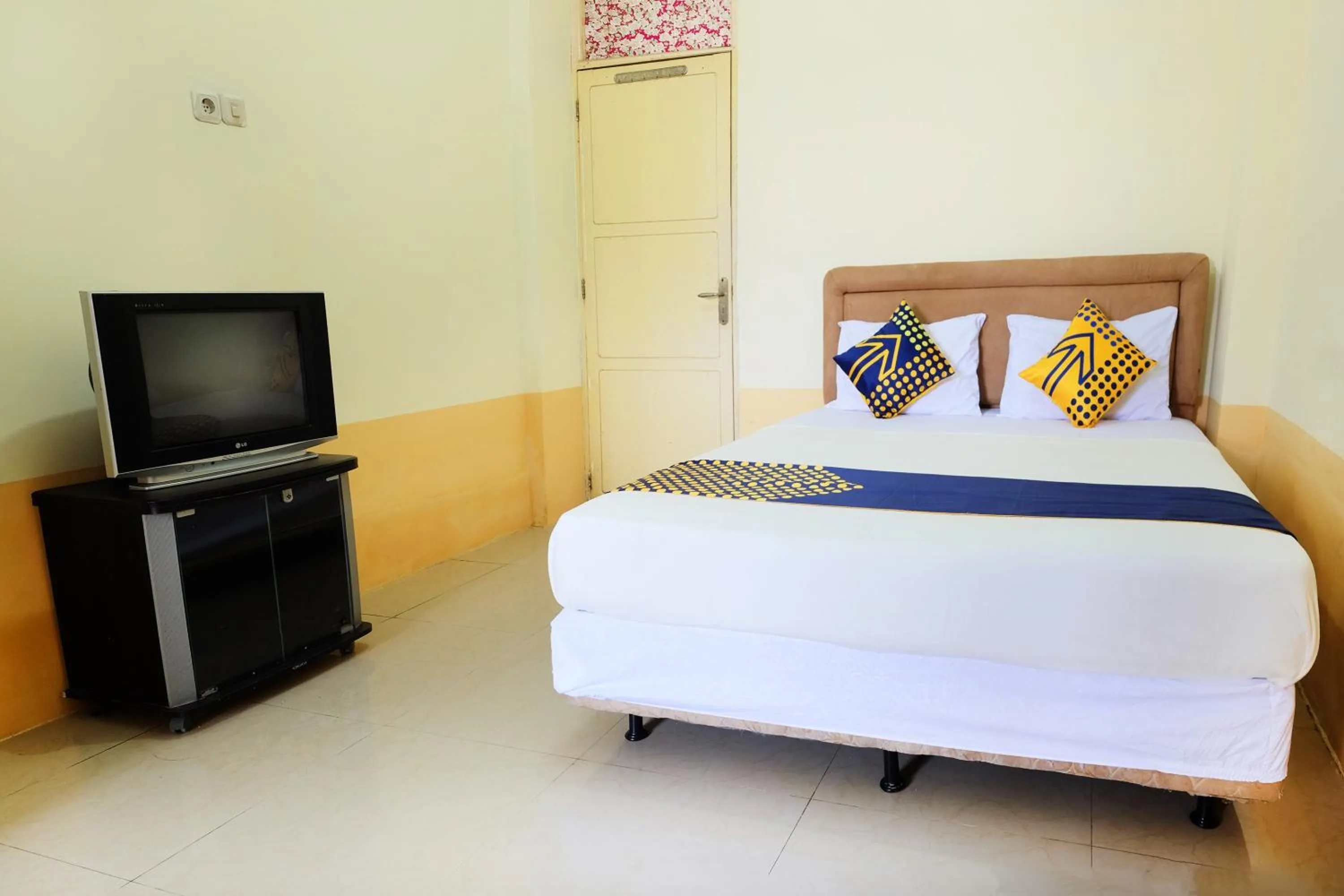 Bedroom in Hotel O Zn Guest House