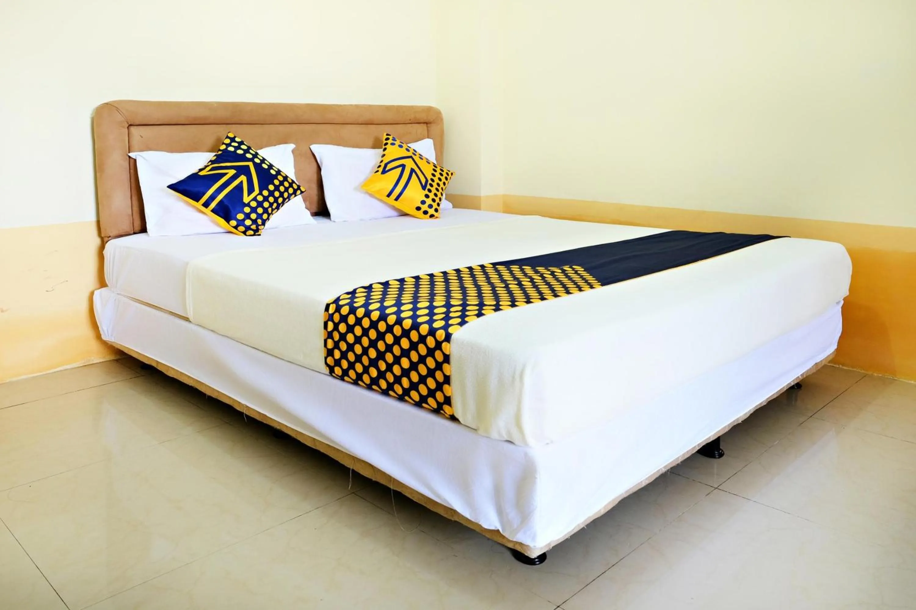 Bedroom in Hotel O Zn Guest House