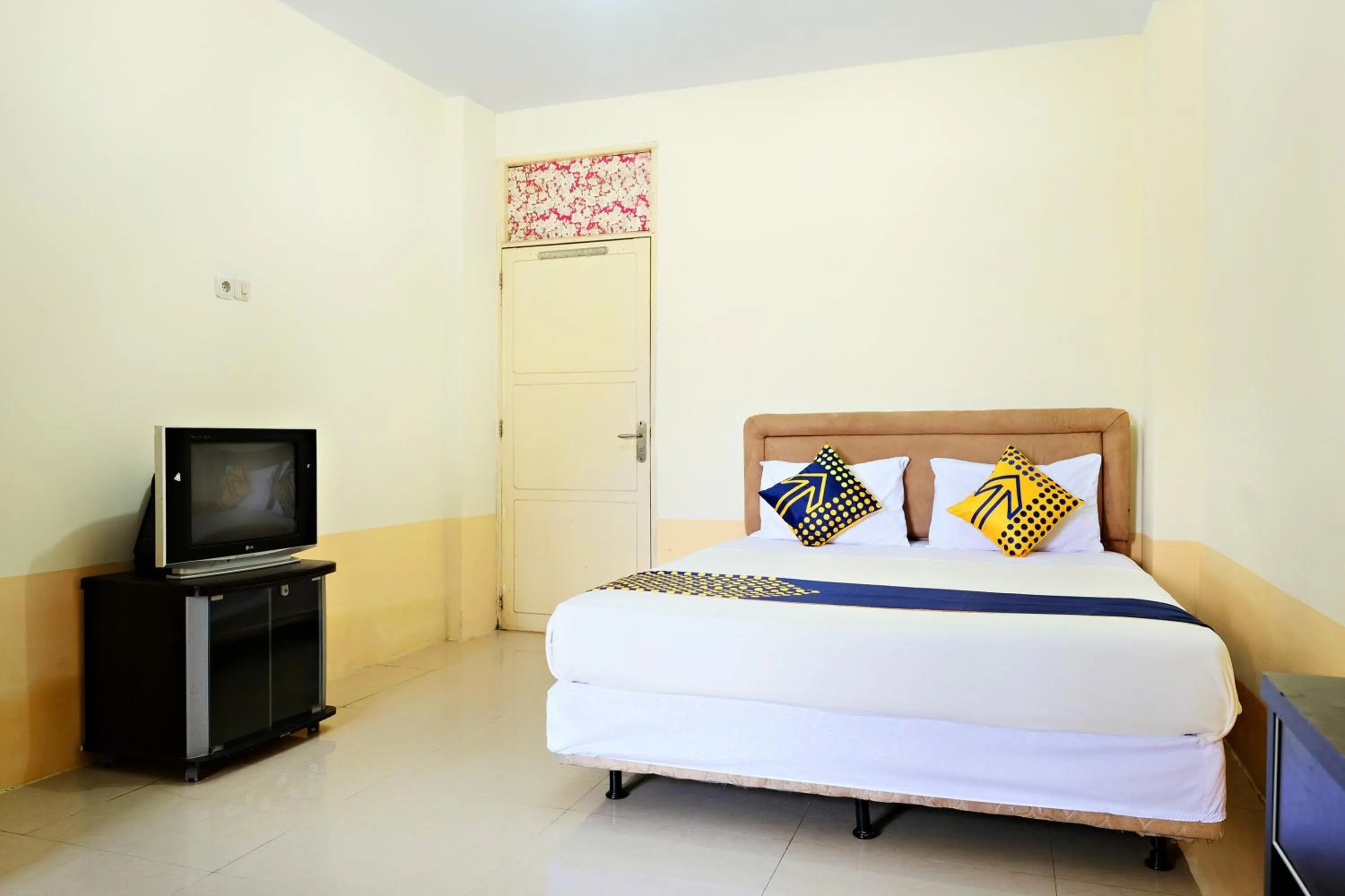 Bedroom in Hotel O Zn Guest House