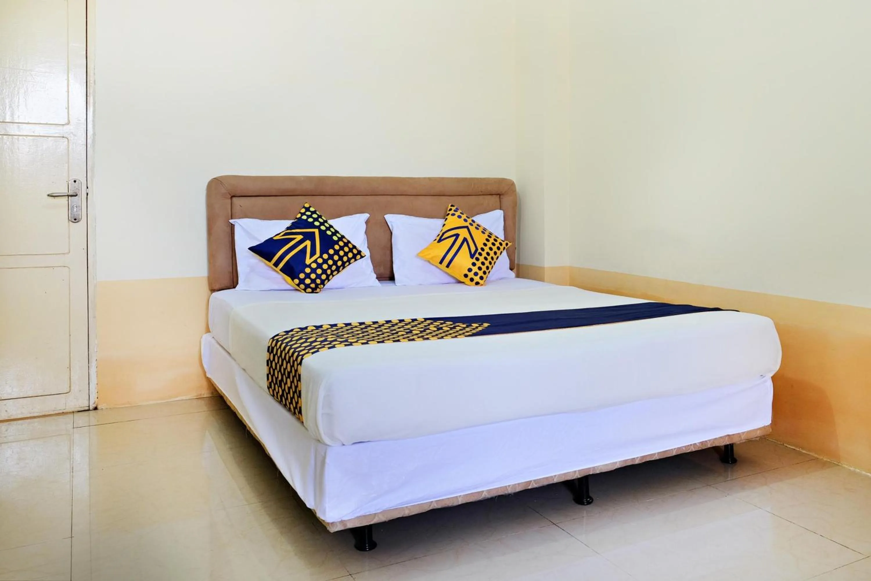 Bedroom in Hotel O Zn Guest House