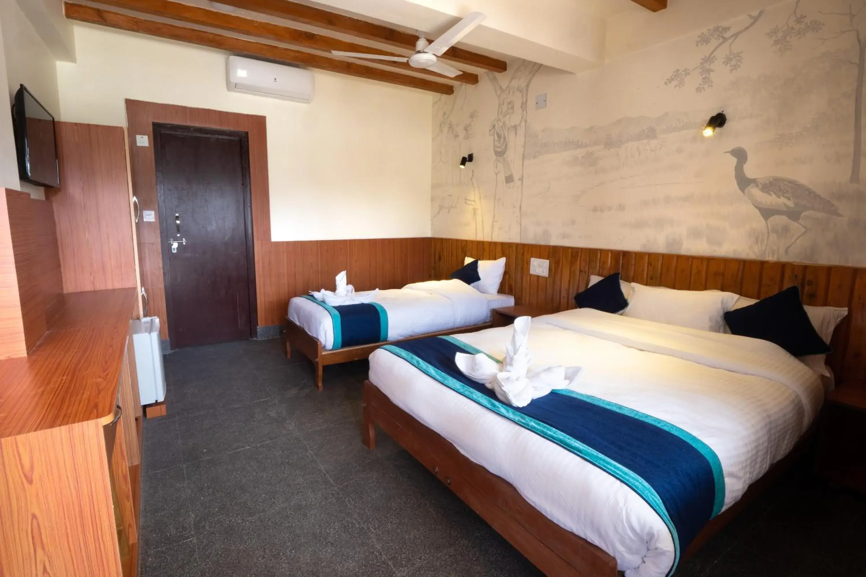 Triple Room with Pool View in Babai Resort Pvt Ltd Triple Room with Pool View in Babai Resort Pvt Ltd