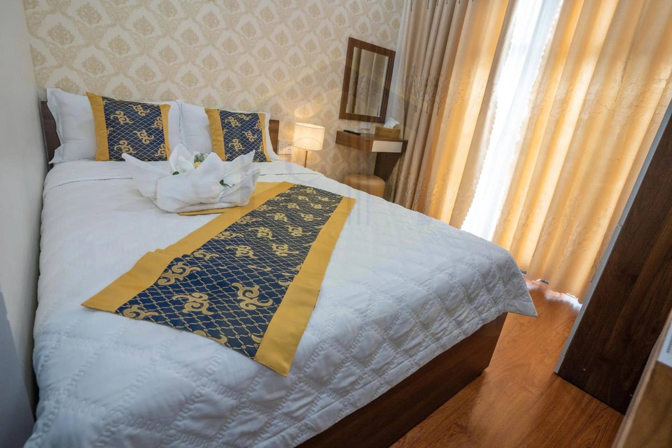 Bed in GOLD CITY Hotel